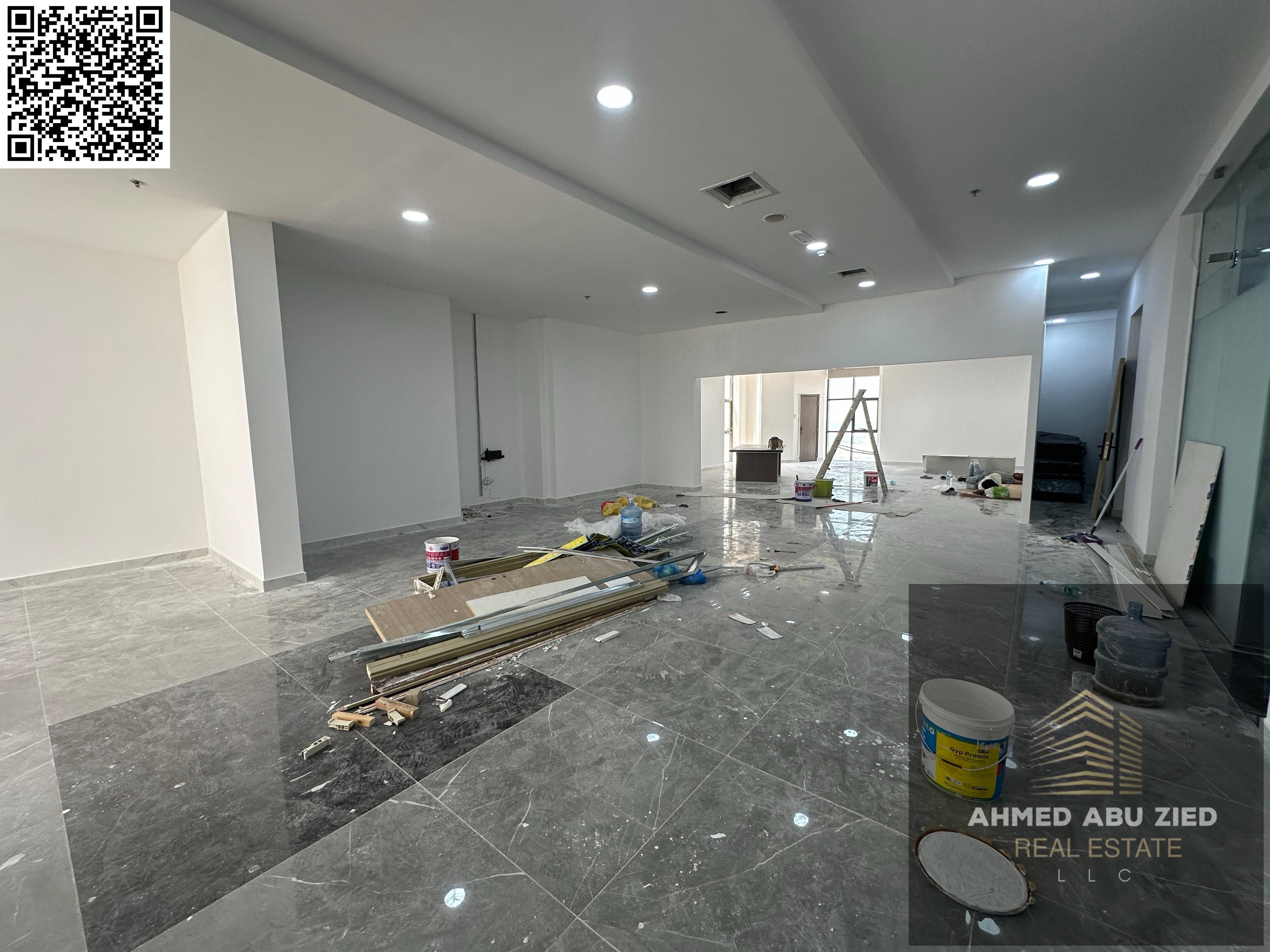 A prime opportunity for annual rent: a spacious office or company headquarters in Ajman – Al Rashidiya, strategically located with direct creek views.