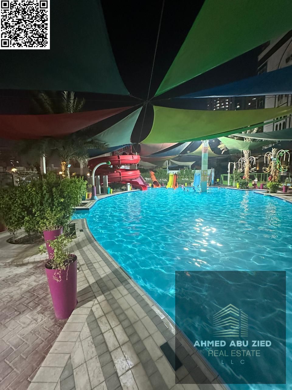 One month free, free gym, free pool, free water park. Luxury 1BR with living room, 2 baths, balcony, wardrobes, modern finishes, prime location near s