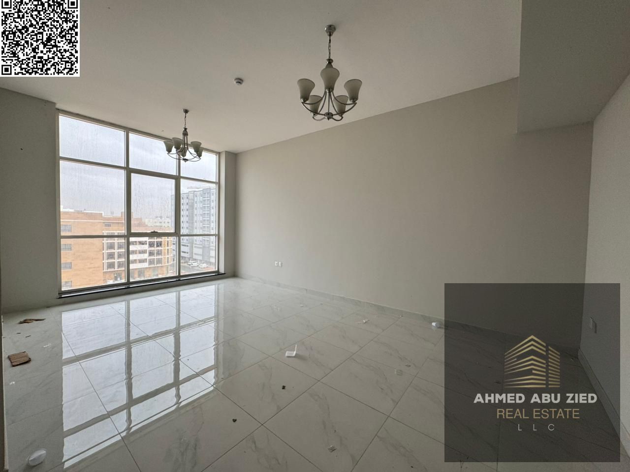 First tenant, spacious elegant 2BR hall in Ajman, large area, open-view balcony, modern refined finishes, prime location with easy access to Dubai & S