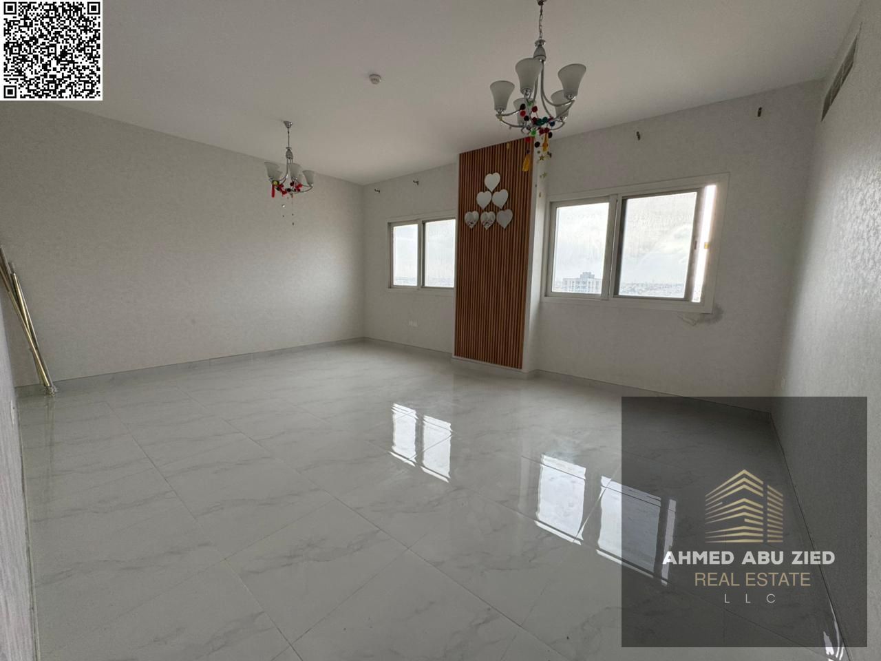 First tenant elegant 2BR hall in Ajman, new building, large area, open-view balcony, modern refined finishes, prime location with easy access to Dubai