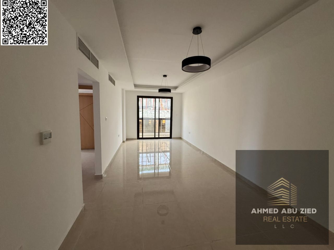 Elegant 2BR hall in a new building, first tenant, free month, 3 bathrooms, open-view balcony, modern refined finishes, prime location with easy access