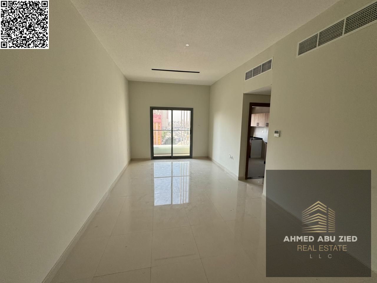 New building, first tenant, elegant 2BR hall with open-view balcony, built-in wardrobes, modern refined finishes, prime location near services with ea