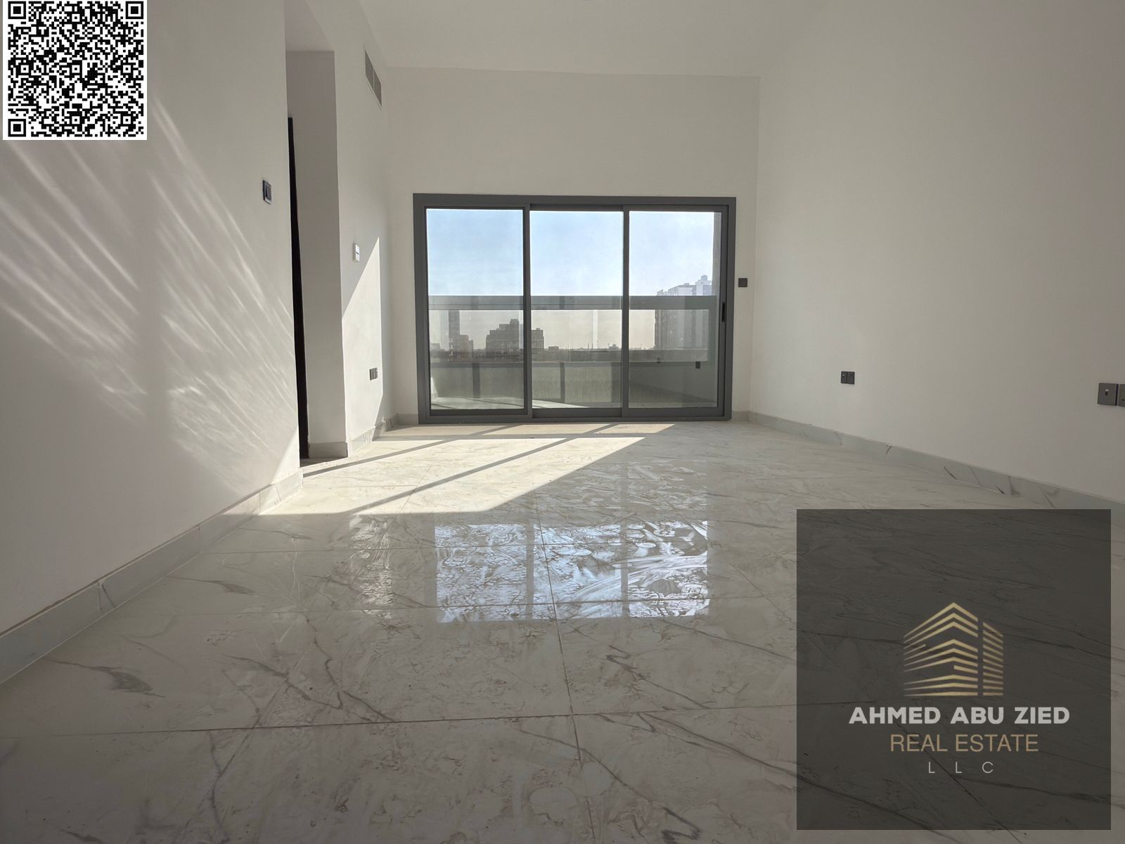 New building, first tenant, elegant 1BR hall in Ajman with built-in wardrobes, open-view balcony, large area, modern refined finishes, prime location