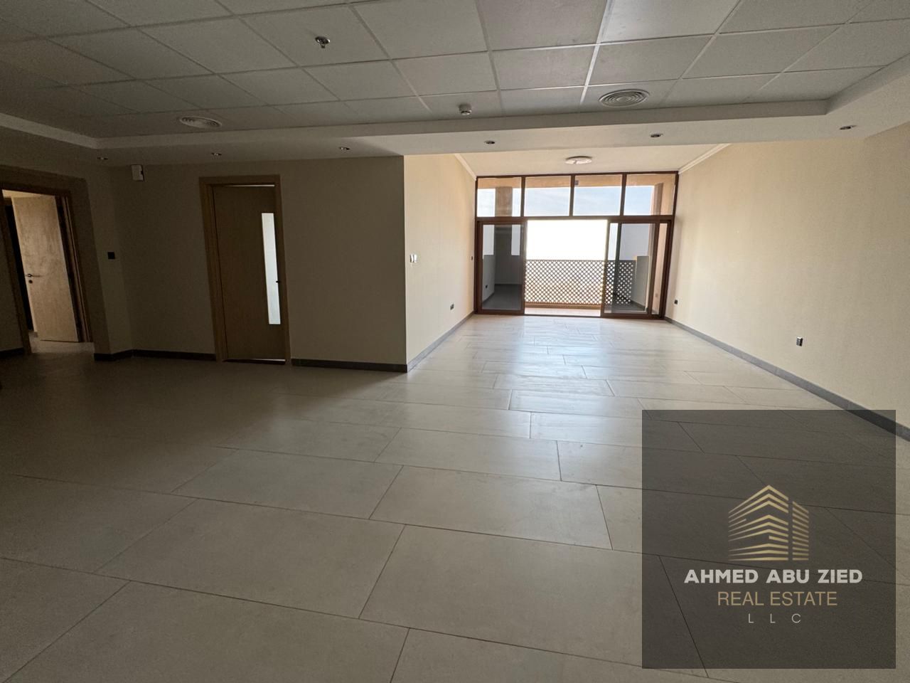 Largest 3BR+hall apartment for rent in Al Nakheel, Ajman. Modern finishes, maid & laundry rooms, 1 month free, free parking, prime location near servi