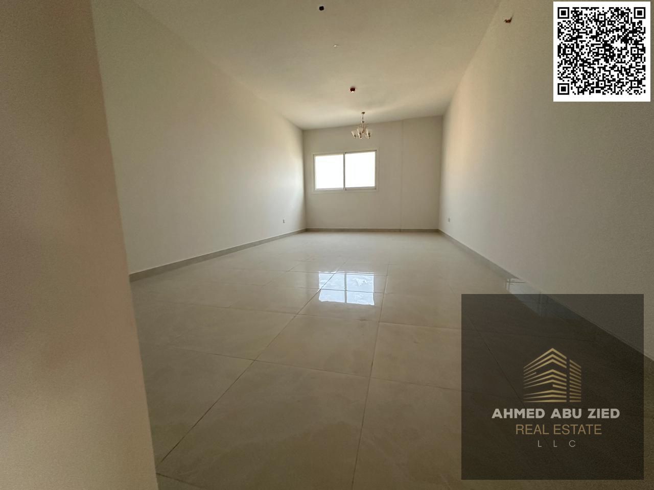 Largest 2BR hall in Al Rumaila Ajman—built-ins for extra space, laundry room, upscale location near Ajman Corniche, plus pool access.