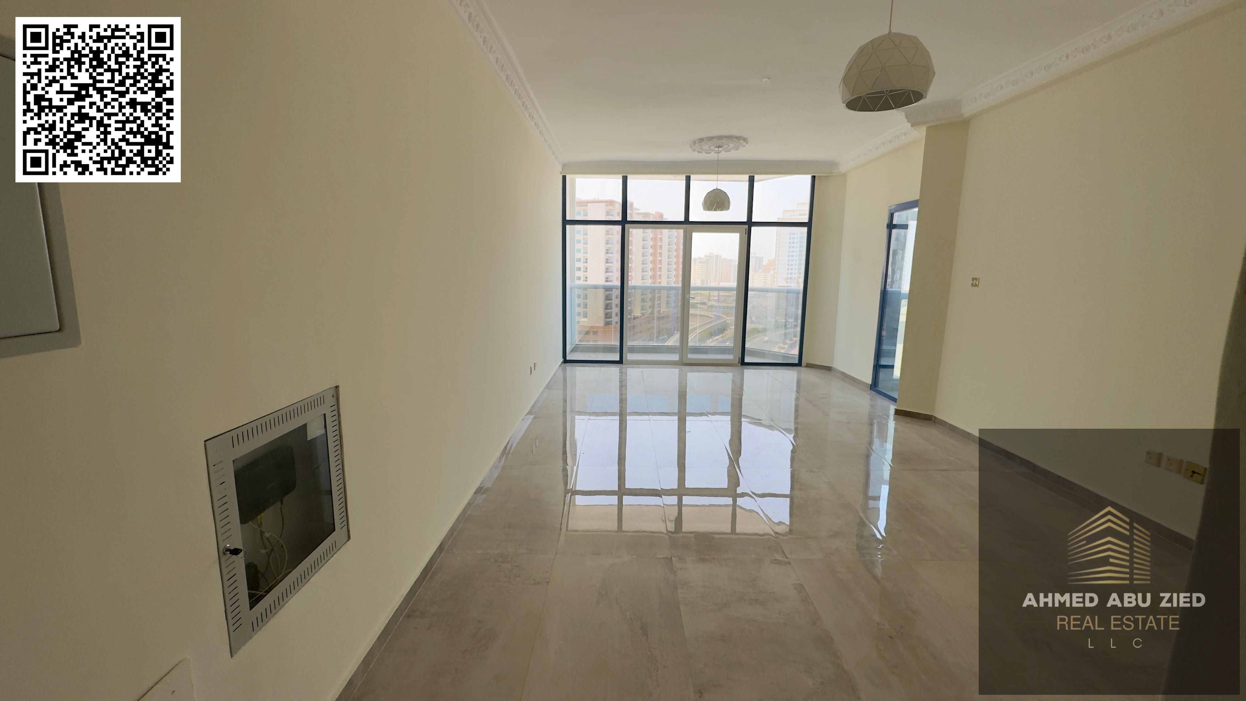 Annual rent: brand-new 1BR hall in Musheref; master bedroom, open-view balcony, 2 baths, spacious kitchen; with free parking & gym.