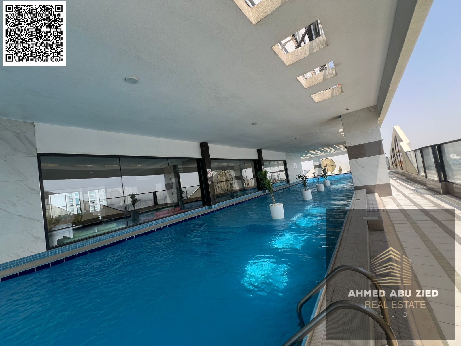 Annual rent | Elegant 1BR hall in Al Rashidiya 1 | Wall closets, central AC, equipped kitchen with appliances, 2 baths | Gym, pool & aqua park.