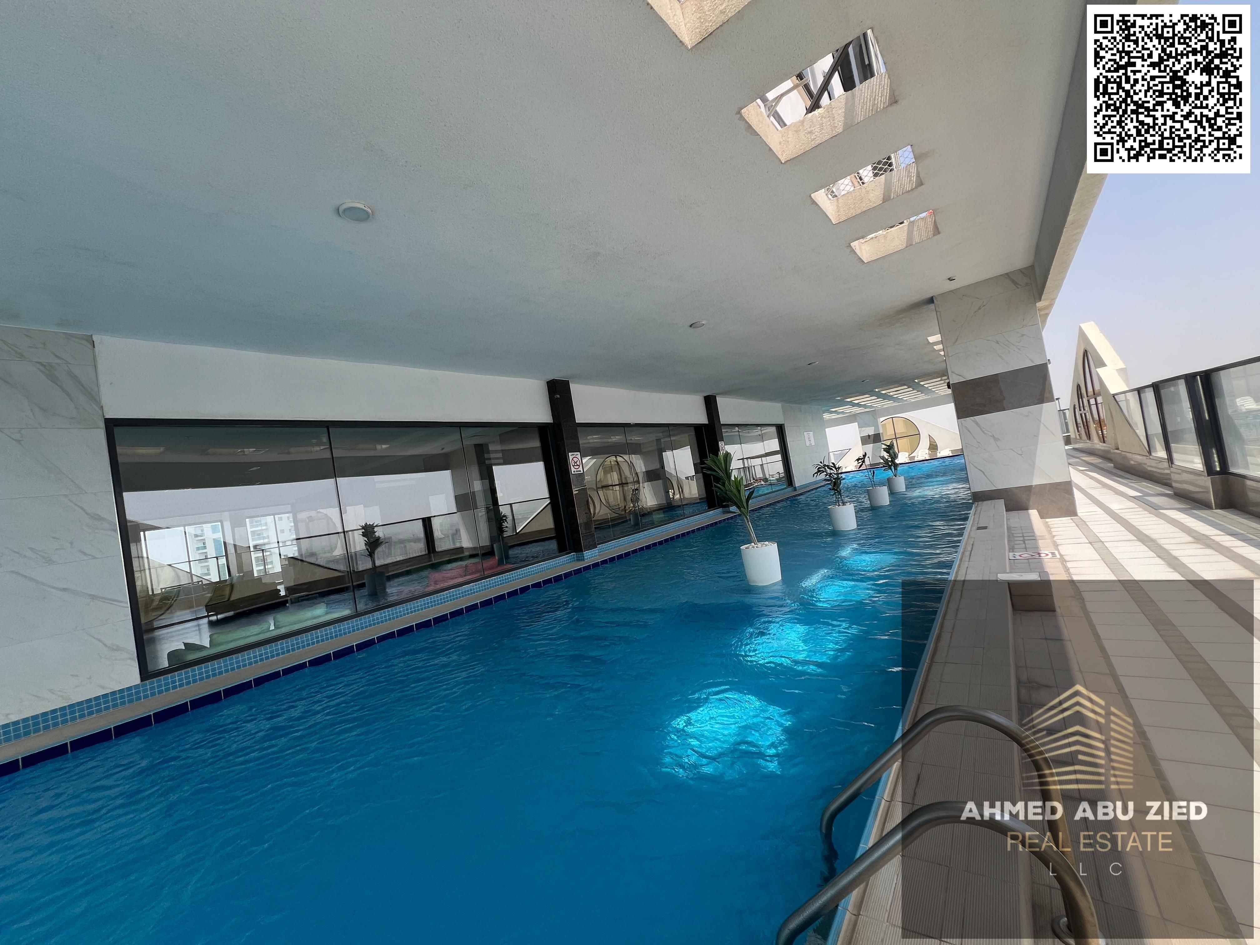 2-bedroom apartment for annual rent in Rashidiya 1, near schools, balcony, built-in wardrobes, amenities included: gym, pool, aqua park.