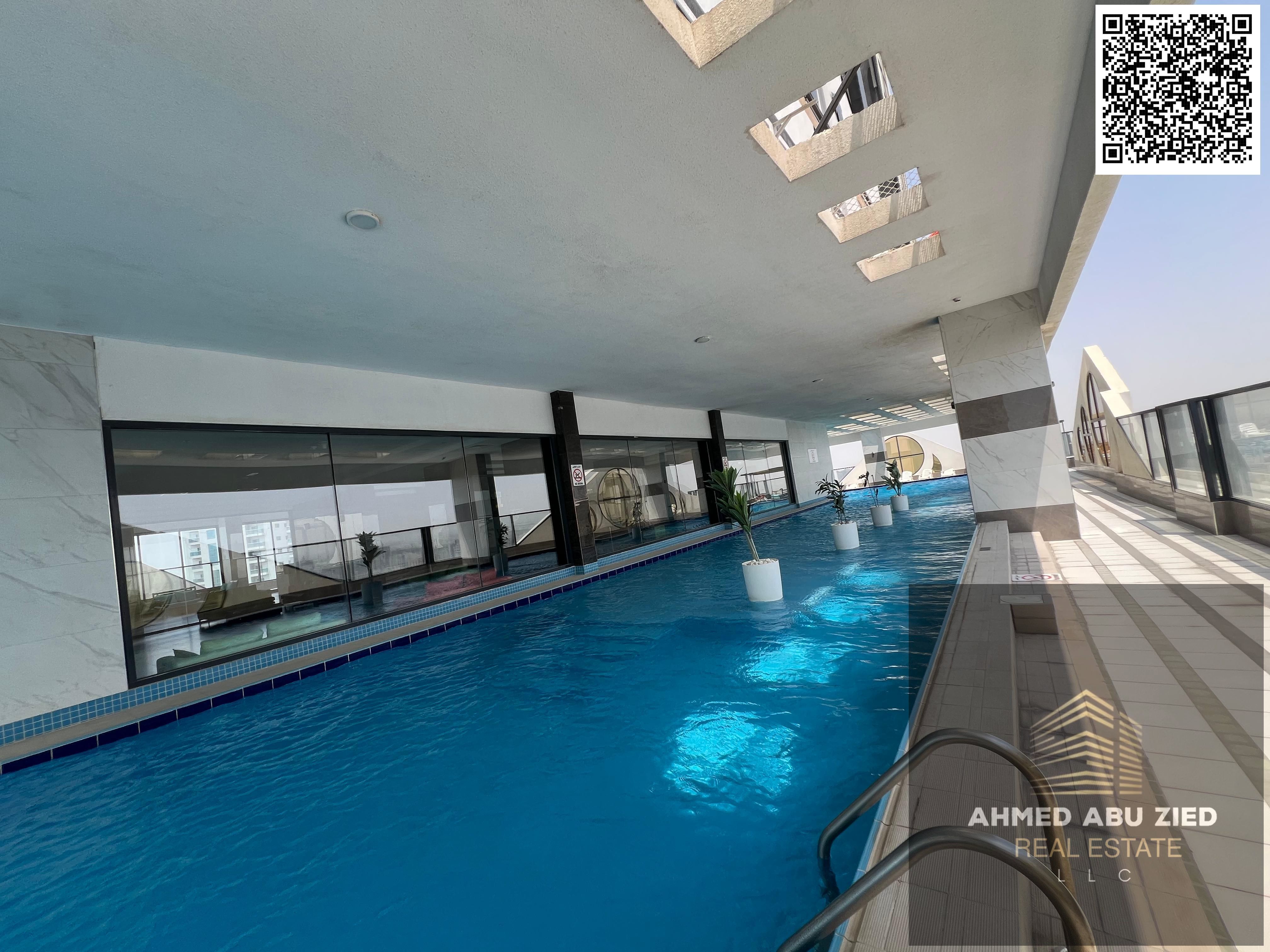 Largest 2BR hall apartment for annual rent in Al Rashidiya 1. Built-in wardrobes, balcony with view, 3 bathrooms, spacious, gym, pool, aqua park.