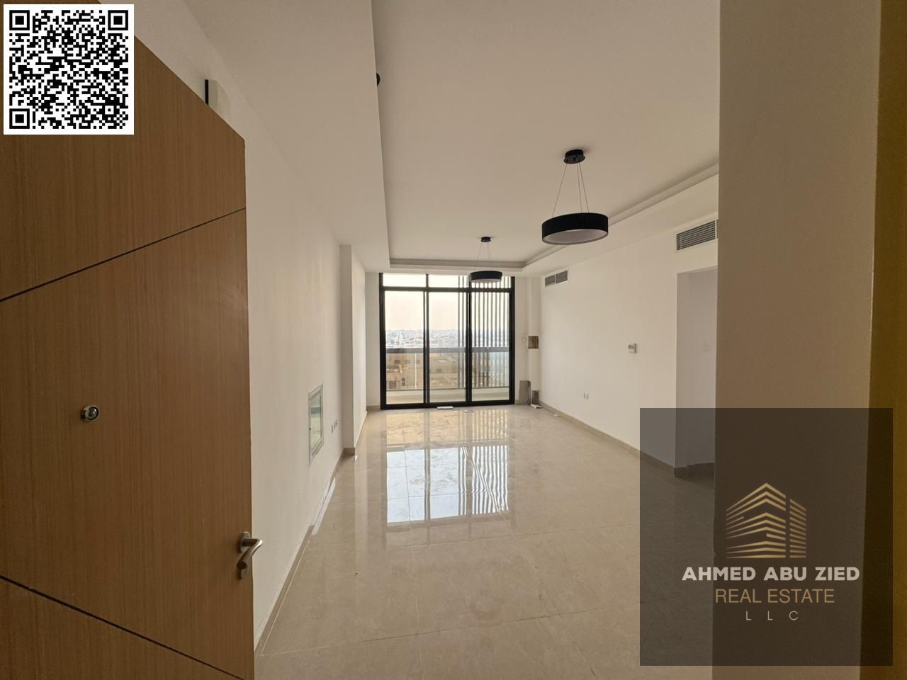 Two bedrooms and a living room, brand new, for annual rent in Al Jurf 3 with one month free. Free parking, new building, balcony, 3 bathrooms, direct