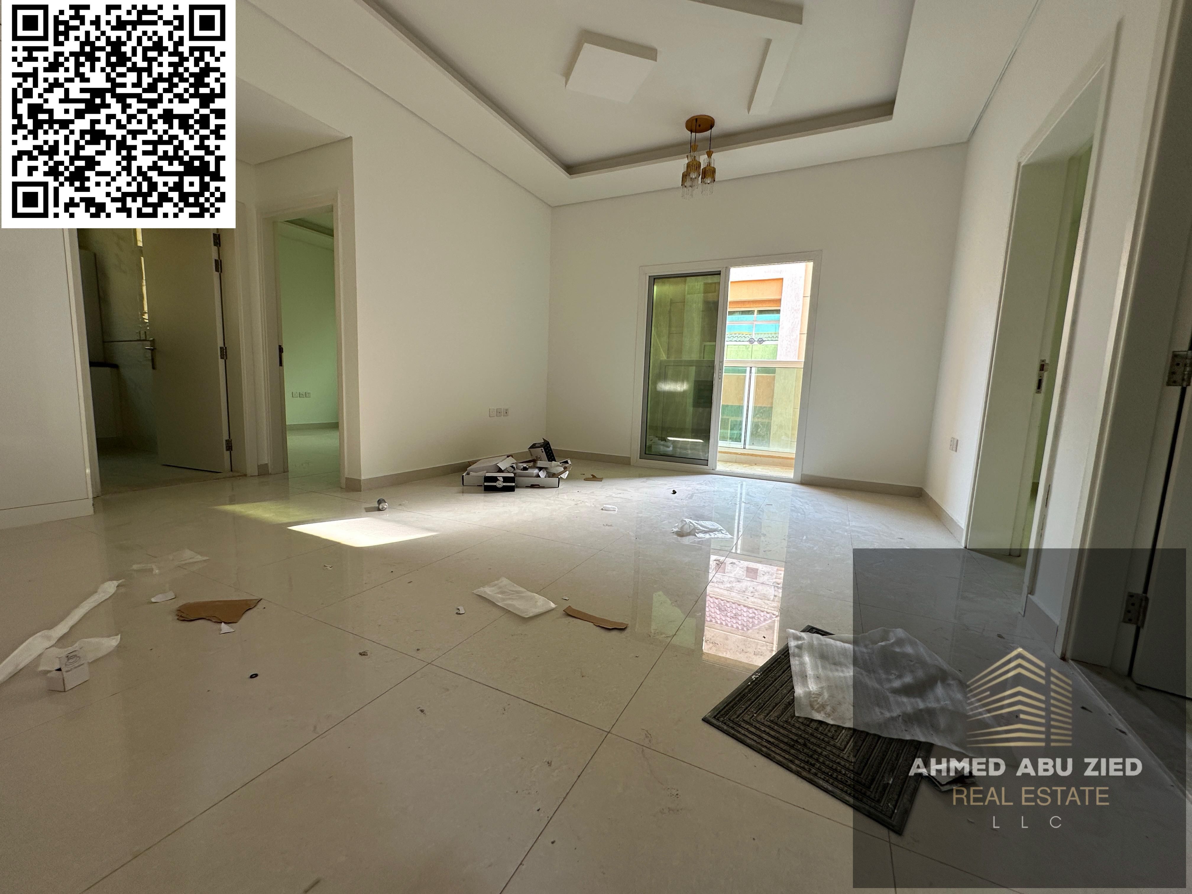 The lowest price for two rooms, a hall, two bathrooms, a balcony, and built-in wardrobes. For Annual Rent – Two-bedroom Apartment in Al Mowaihat 3