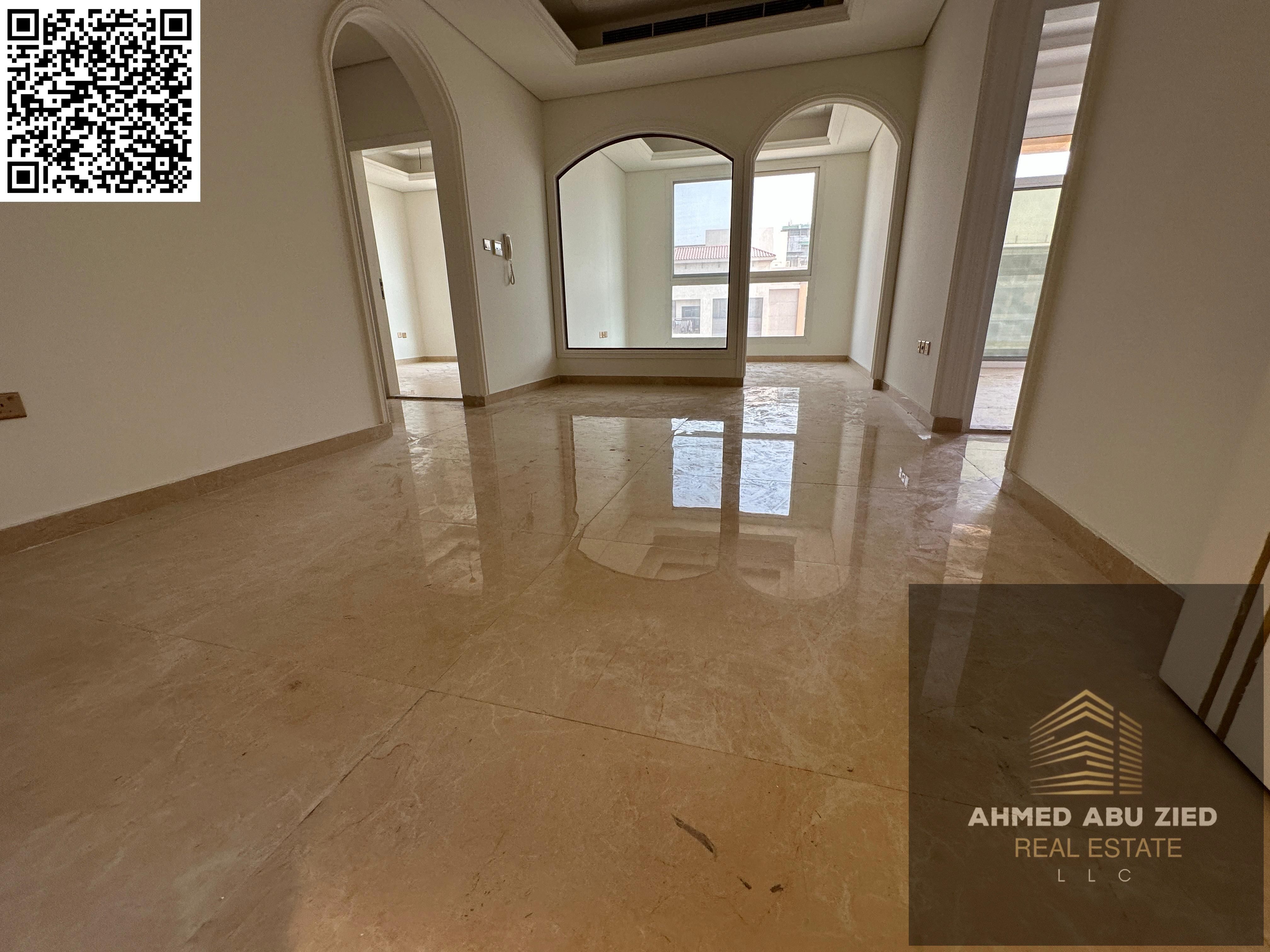 The largest and most elegant two-bedroom apartment, with a hall and a sitting room in Al Muwaihat 3, close to Al Madaris Street and next to the ADNOC