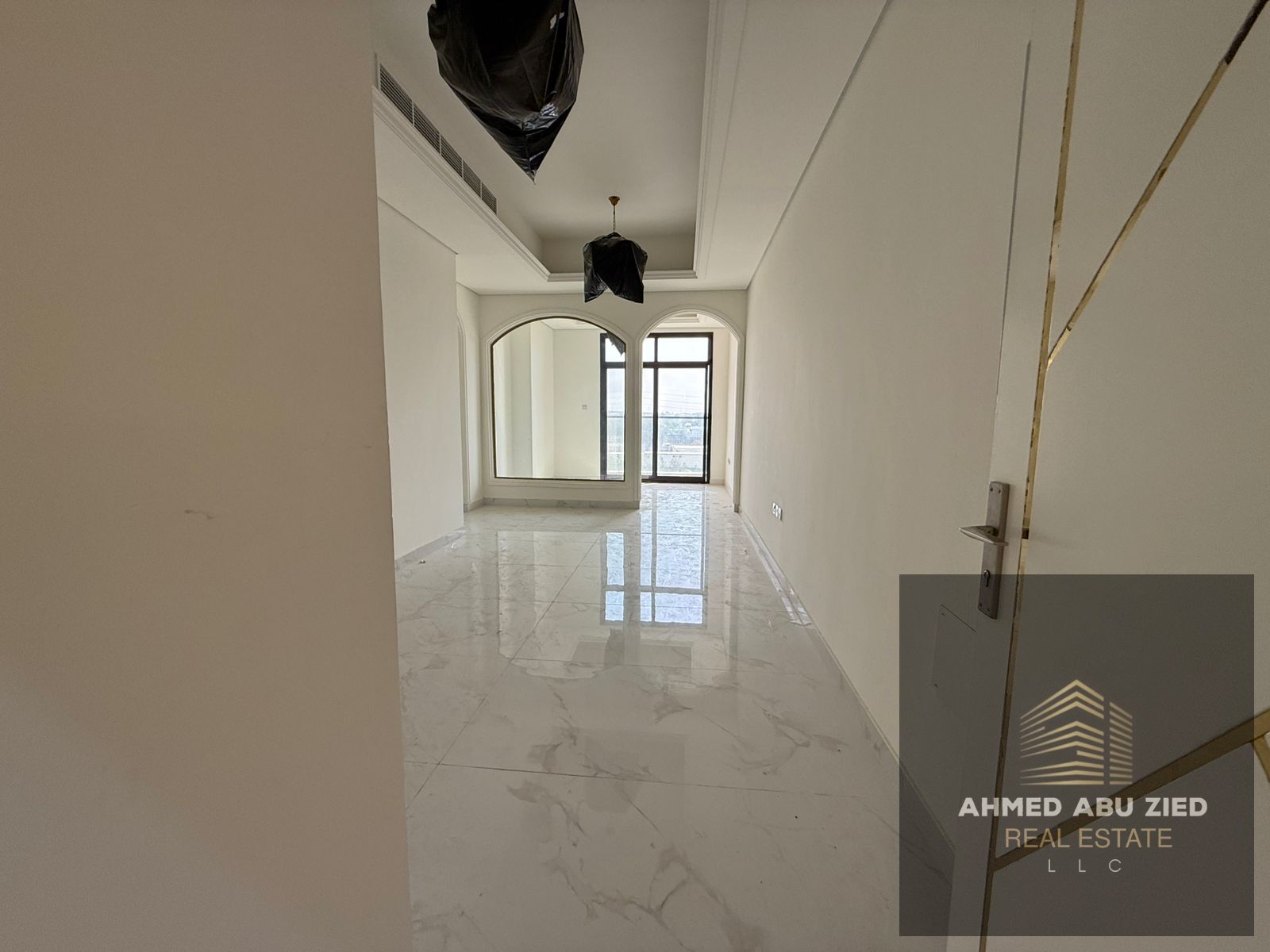 Brand new first-tenant apartment for annual rent in Al Tallah 2, Ajman – featuring 3 bedrooms, hall, majlis, 3 bathrooms, balcony, central AC, built