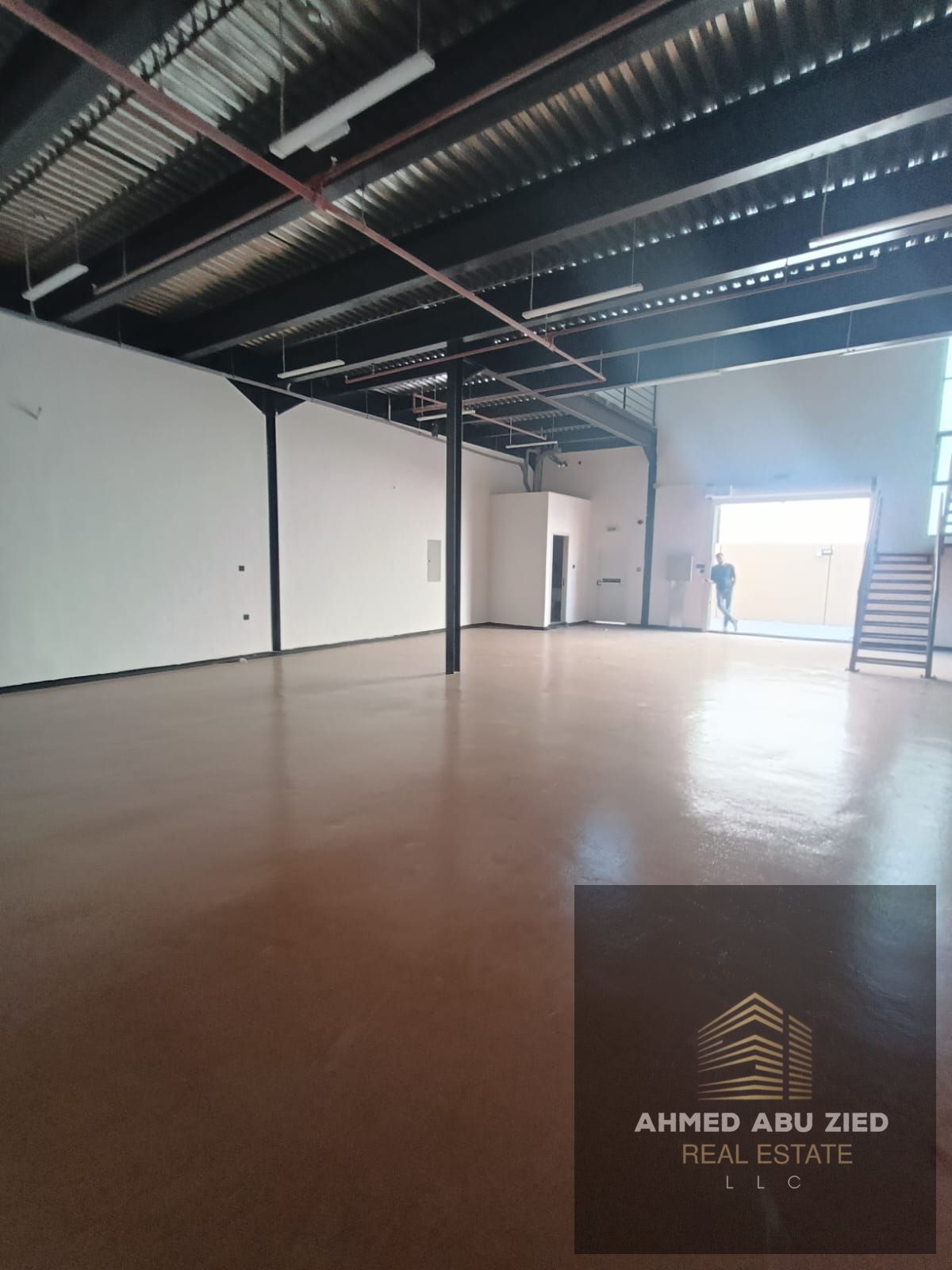 4 warehouses for annual rent in Al Jurf Industrial 1 | Located on a main road near Sheikh Mohammed Bin Zayed Road | Spacious areas with mezzanine | 2