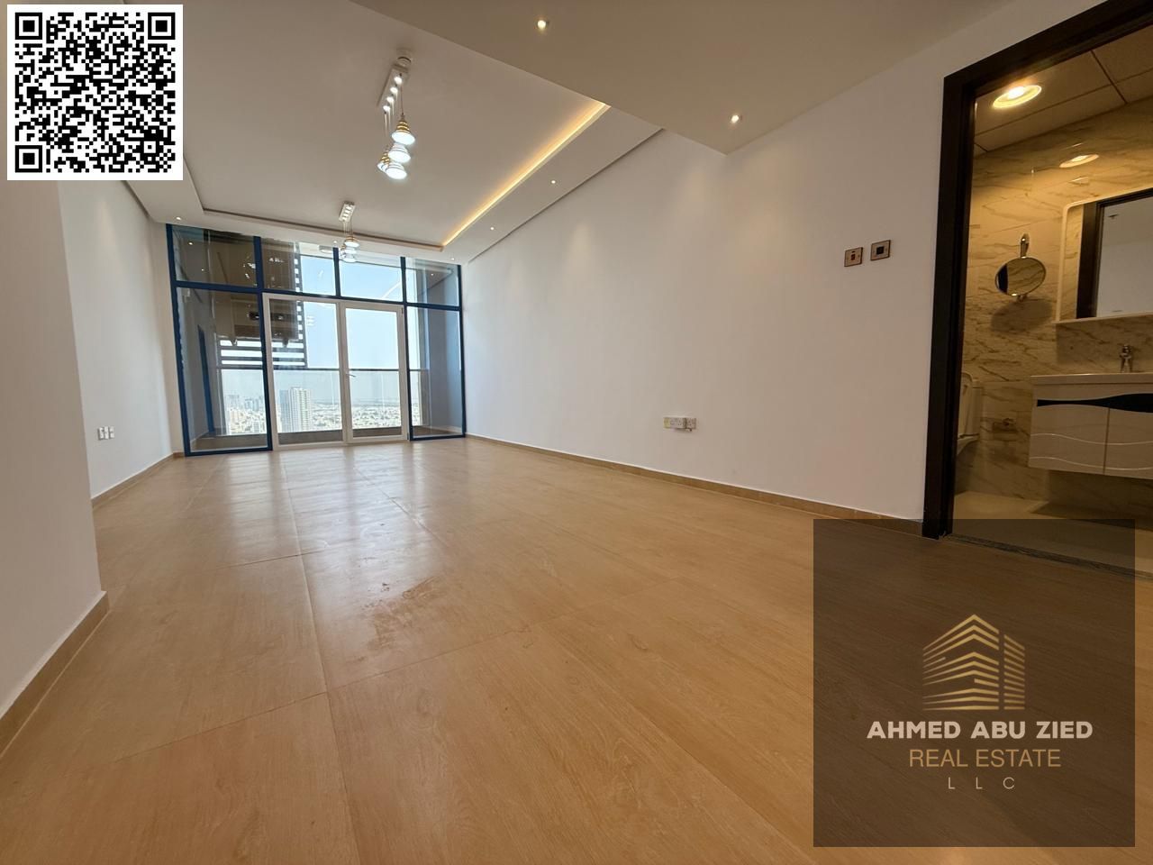 Luxury apartment for annual rent: one bedroom, living room, two bathrooms, central air conditioning, balcony with open view, excellent finishing, prim