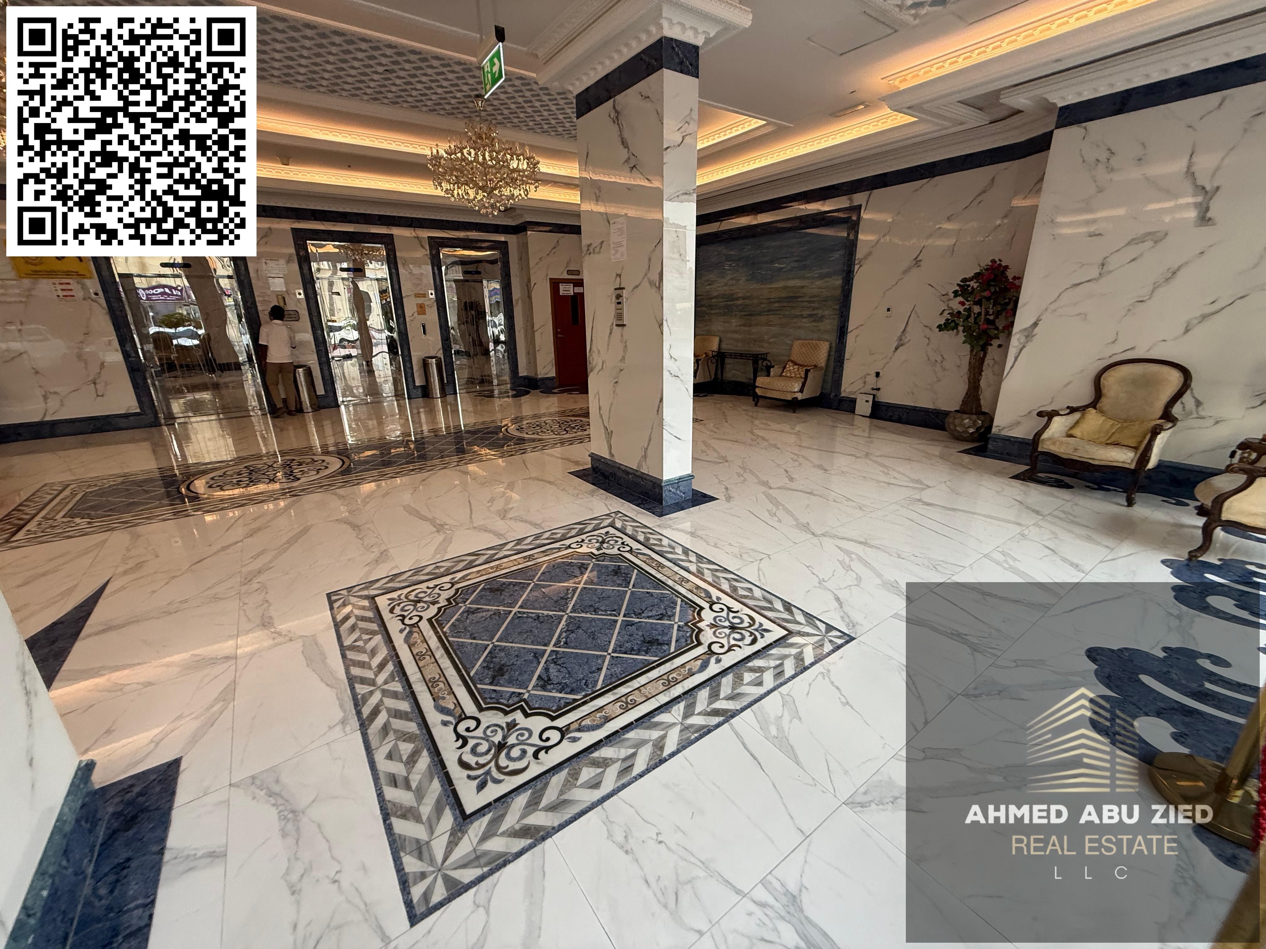 Upscale one-bedroom apartment with a living room, two bathrooms, central air conditioning, a balcony with an open view, and free parking. Prime locati
