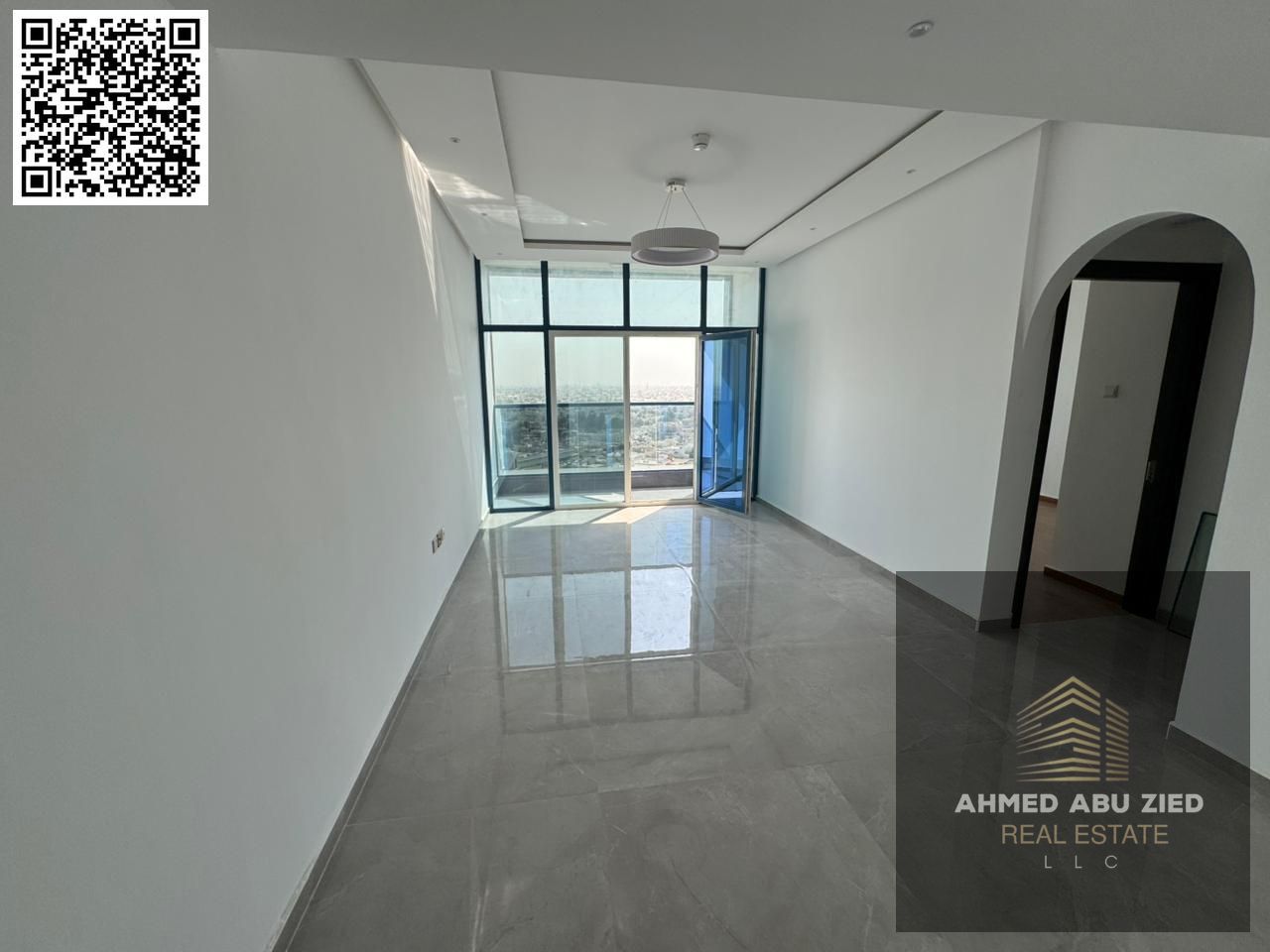 First occupancy, top-of-the-line one-bedroom apartment with a living room, two bathrooms, a balcony with an open view, central air conditioning, and a