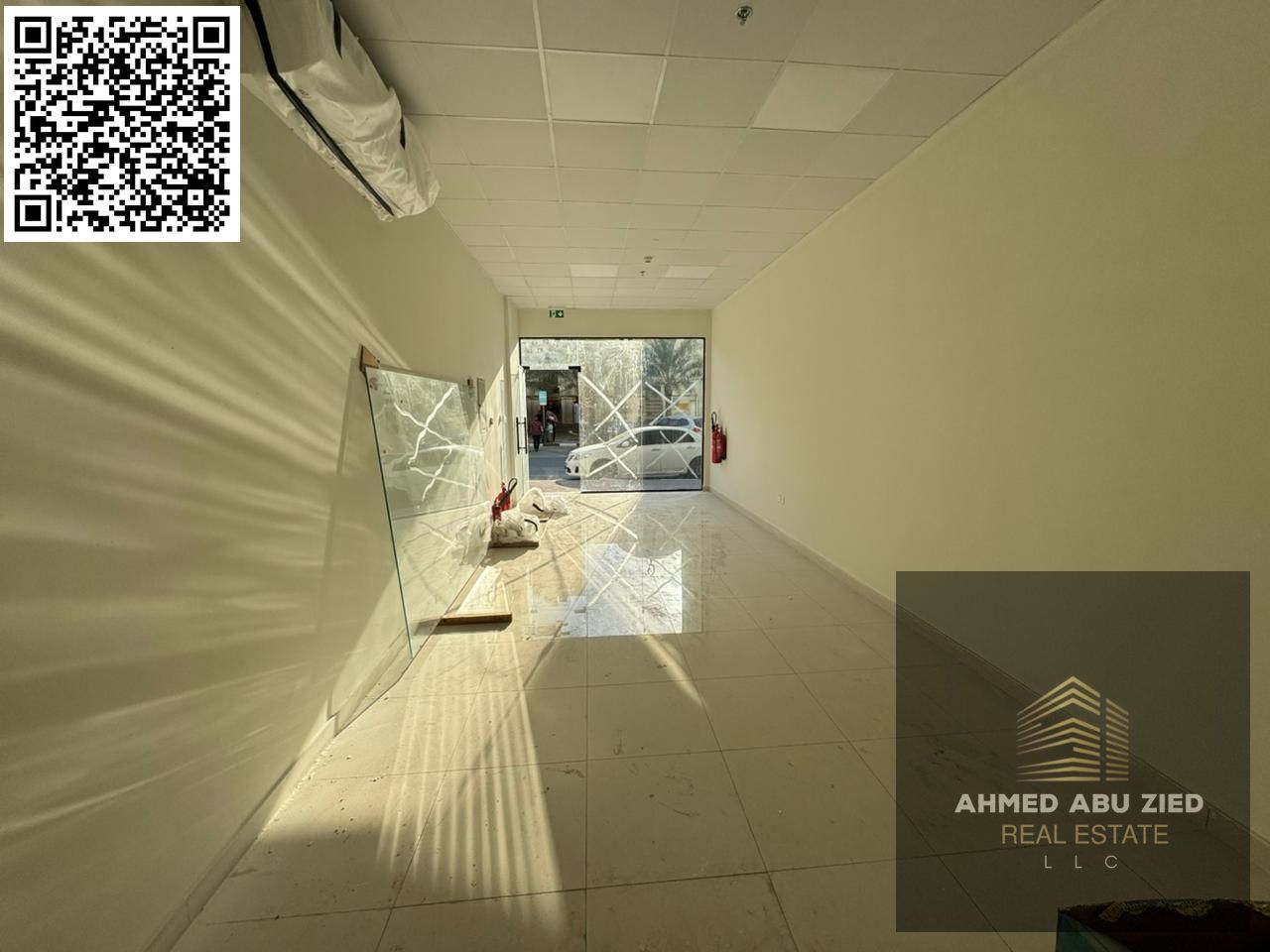 Commercial space for annual rent, very vital location, excellent longitudinal area suitable for all activities, close to Al Hikma School and Thumbay H