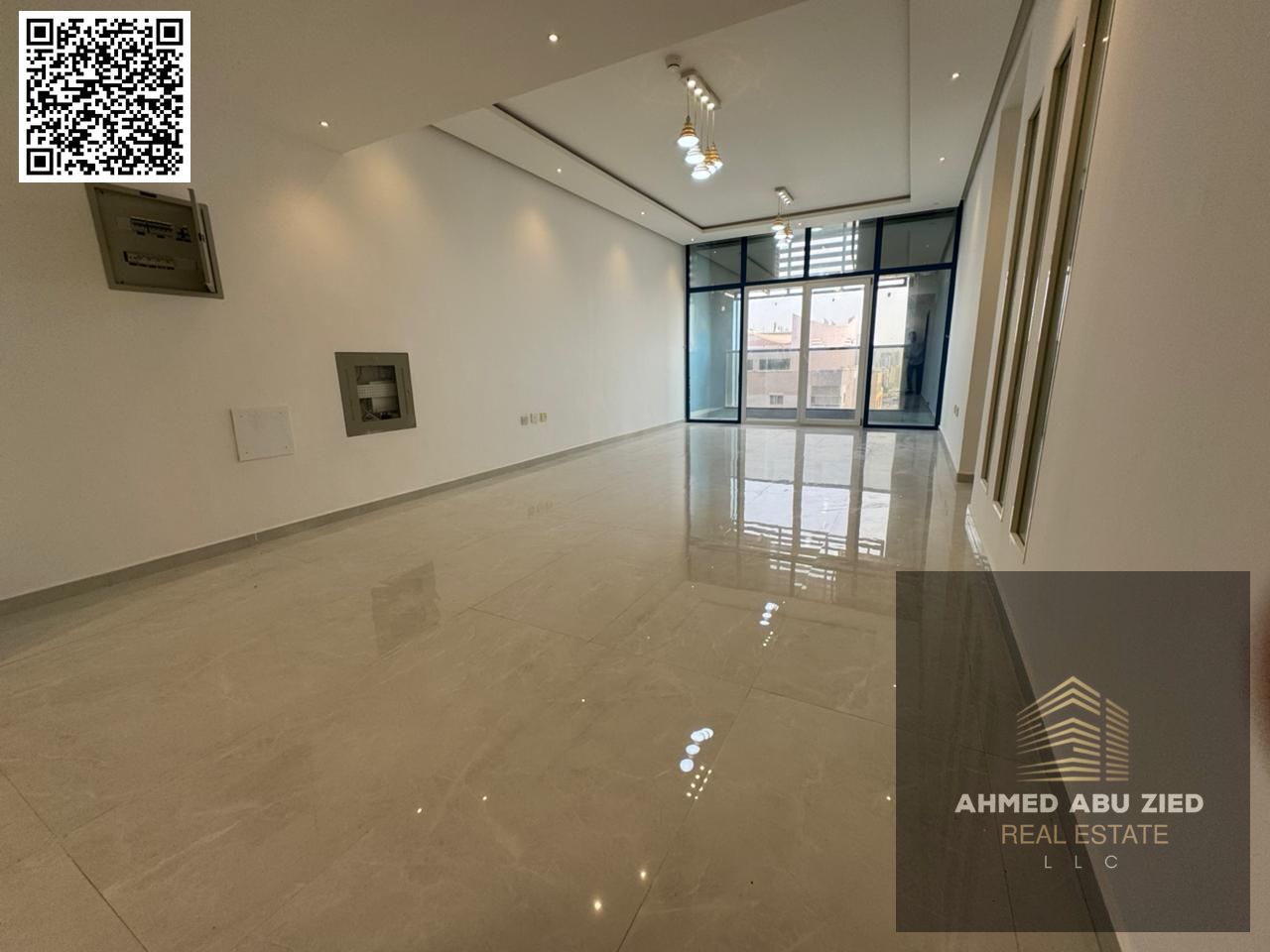 Free parking, built-in wardrobes, central air conditioning, balcony, open view, two bedrooms, living room, maid's room, spacious area, two bathrooms,