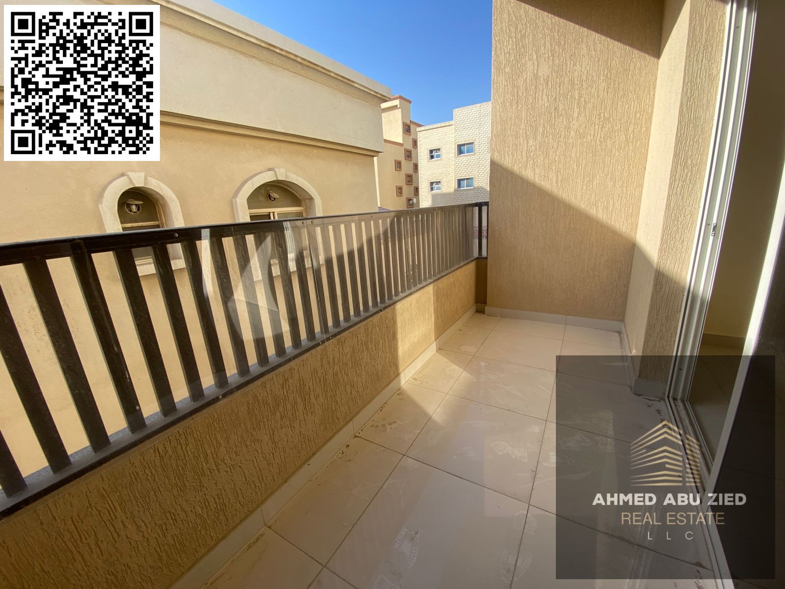 Two-bedroom apartment with a master living room, first occupancy in Al Rawda 1, 3 bathrooms, balcony with open view, central air conditioning, excelle