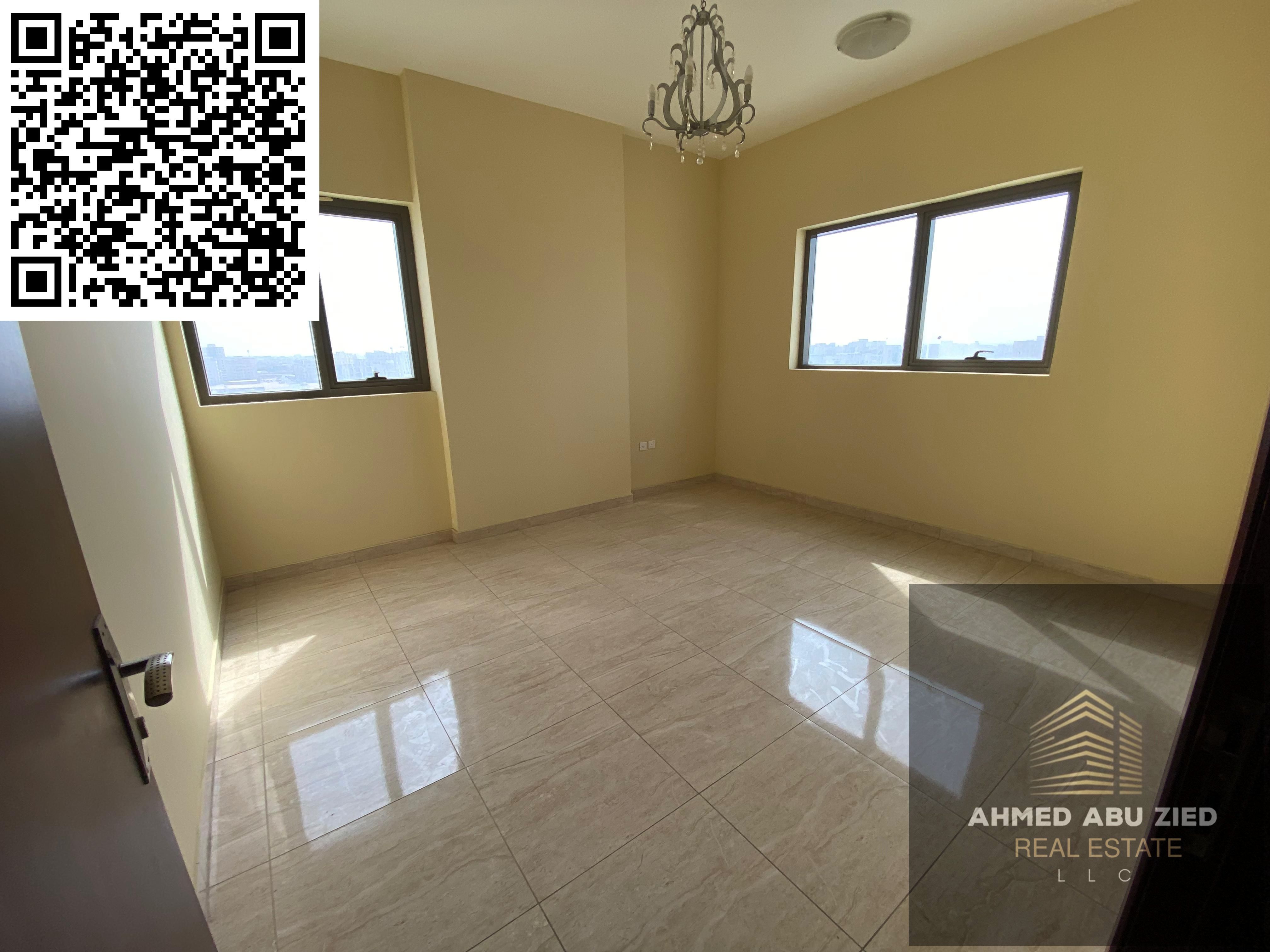 Two rooms and a hall for annual rent in Ajman, in the Al Jurf 3 area, with a modern design, a large equipped kitchen, two bathrooms, and a distinguish