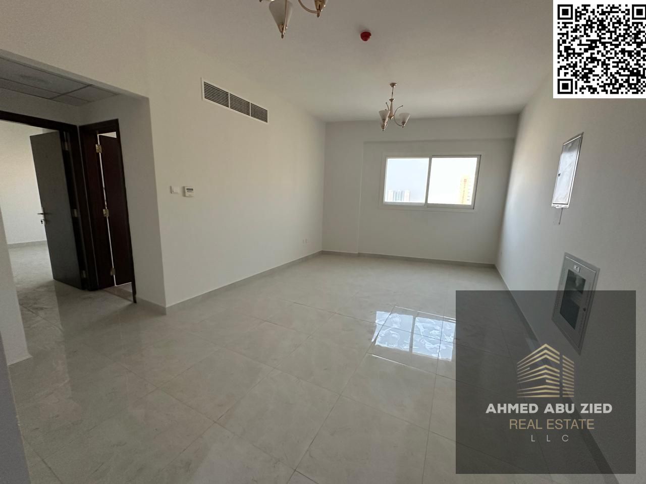One bedroom and living room apartment, first occupancy in Al Rumaila near Ajman Corniche, with 2 bathrooms, 2 balconies, and parking, 4 installments,