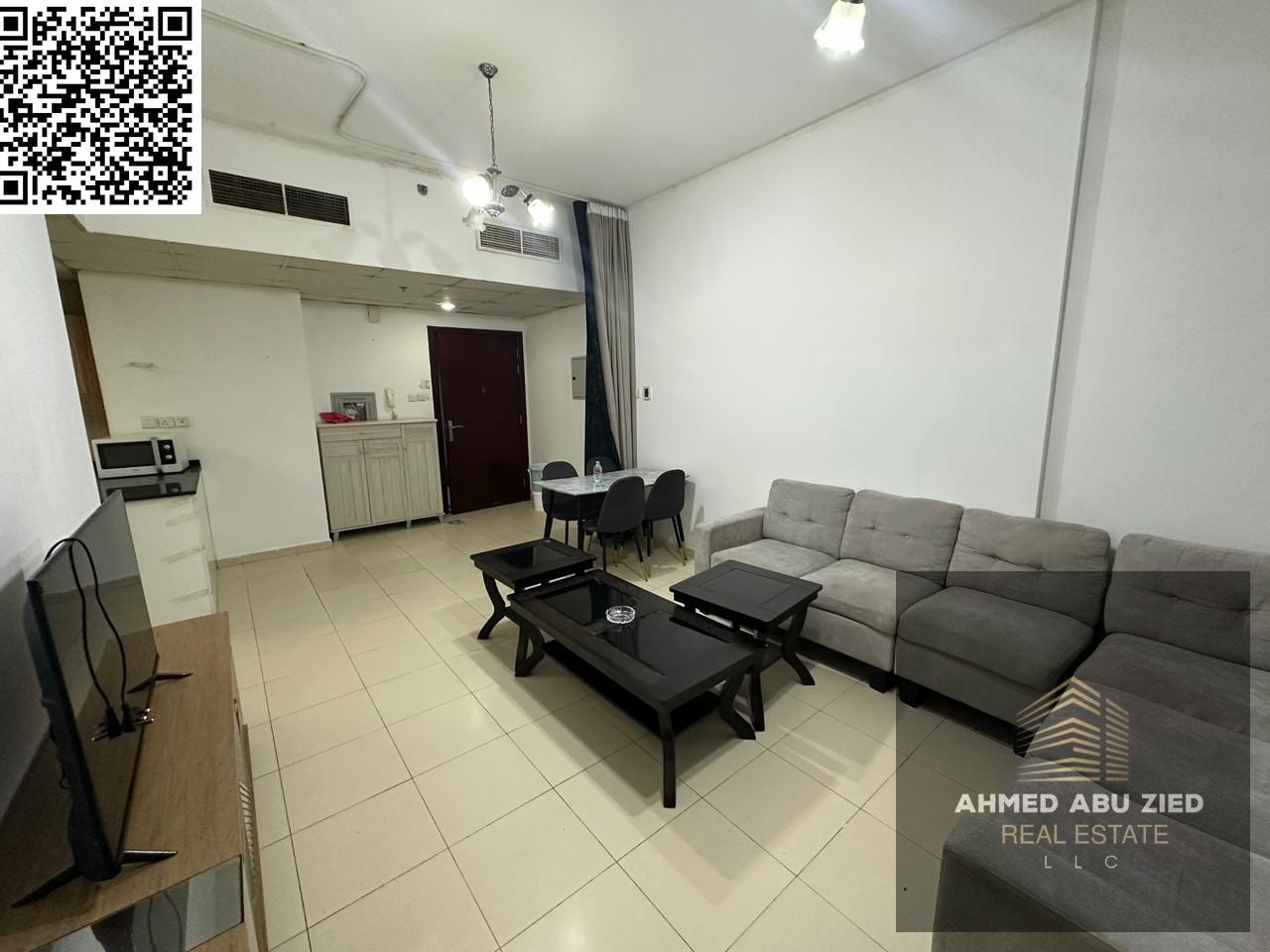 Furnished two-bedroom apartment with a living room for annual rent in City Towers, Ajman, next to Safeer Mall and Khalifa Main Street, prime location