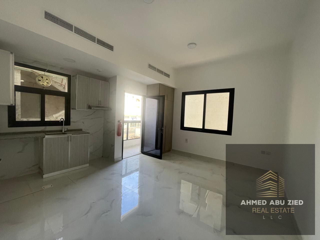 For annual rent: Brand new studio apartment with a balcony in Al Aaliyah, prime location on the Dubai exit, high-end finishing, at a reasonable price.