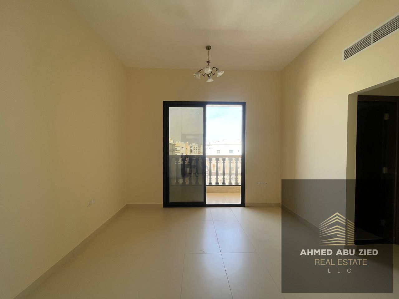 For annual rent: One-bedroom apartment in Al Aaliyah, first occupancy, with two bathrooms, balcony, and master bedroom. Prime location near Dubai exit