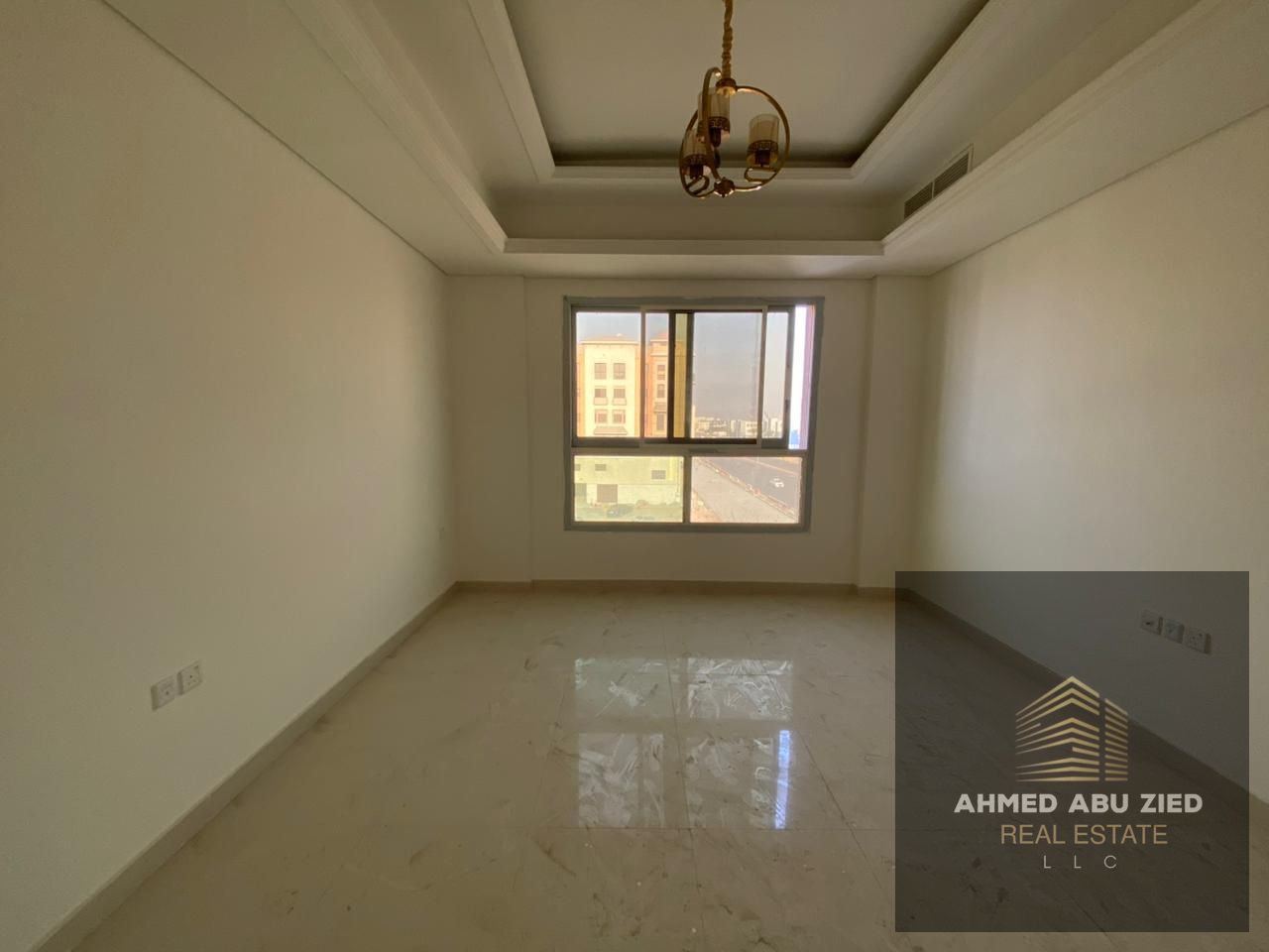 Three-bedroom apartment with a living room for annual rent, first occupancy, in Ajman, Al Muwaihat 3, next to Al Shuwaifat School, new building, one m