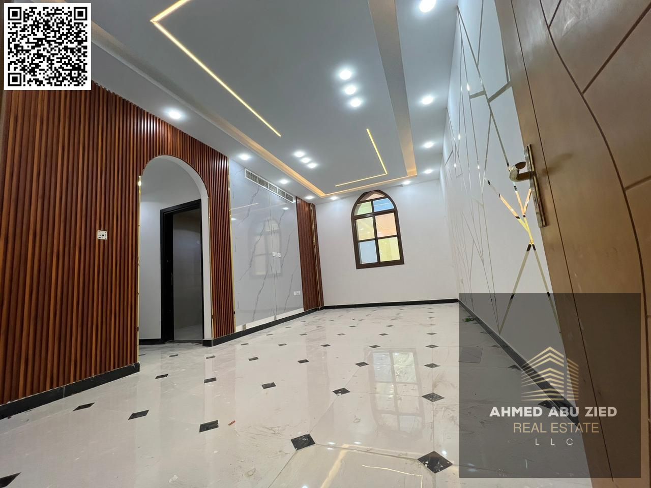 For annual rent – elegant 2-bedroom apartment in Al Rawda 2, Ajman, with master bedroom, 2 baths, spacious living room, and balcony.