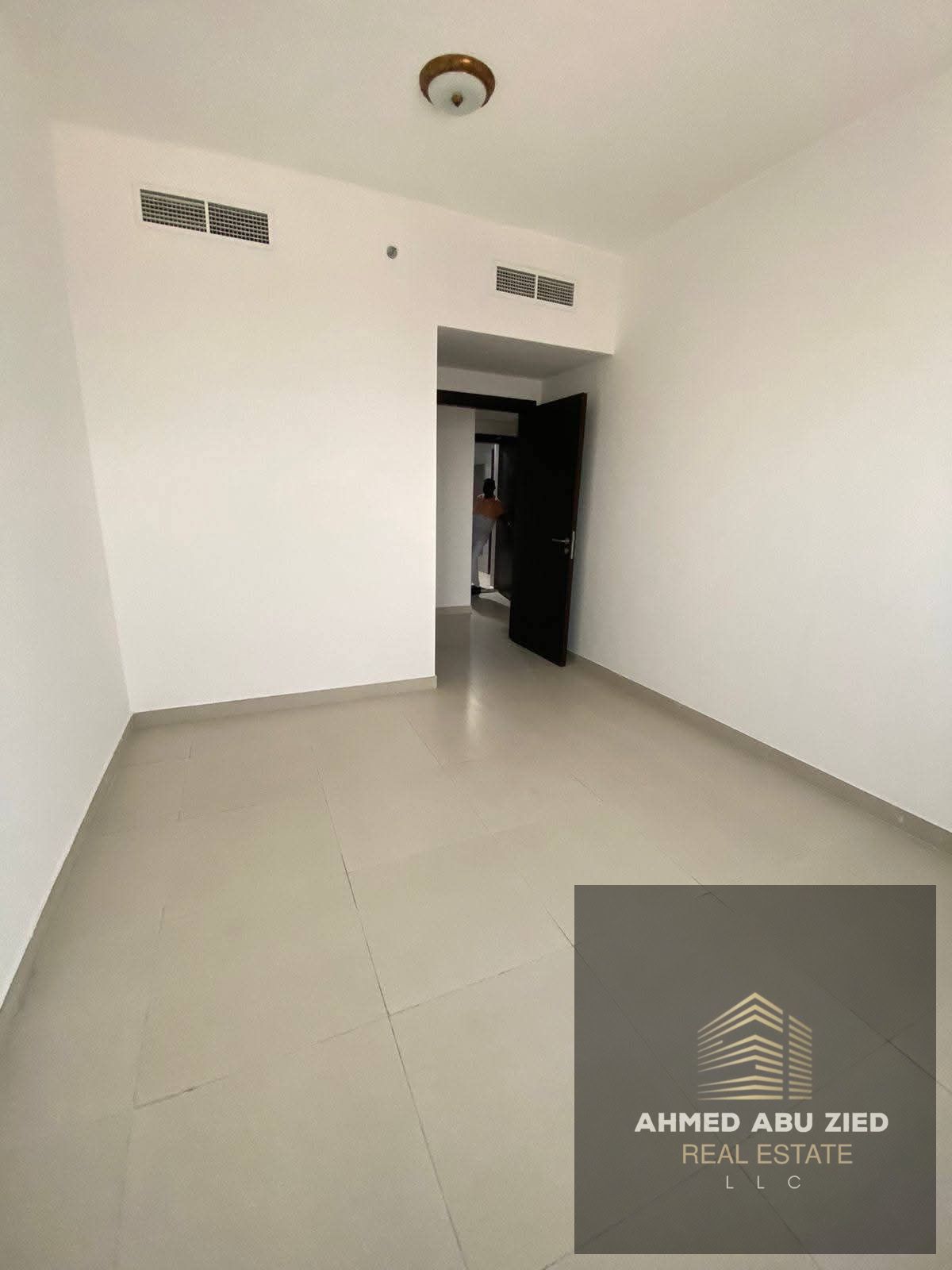 Here’s a concise English version around **150 characters**: **1BR + living on Etihad Street, opposite Thumbay Hospital, near Emirates Markets. AED 33