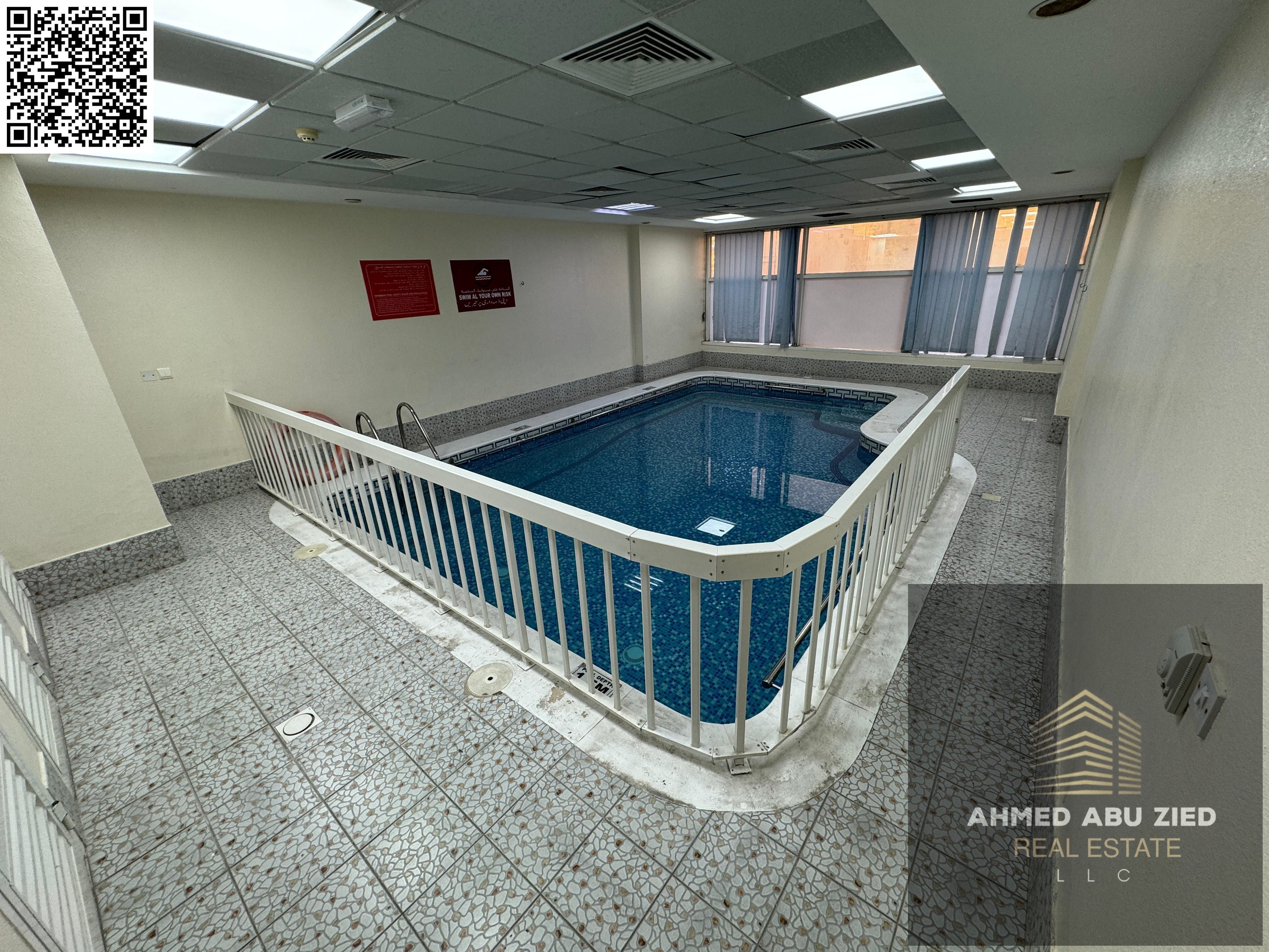 2BR + living room for annual rent in Al Nuaimiya. 2 baths, kitchen, gym, pool, easy access to Dubai & Sharjah exits.