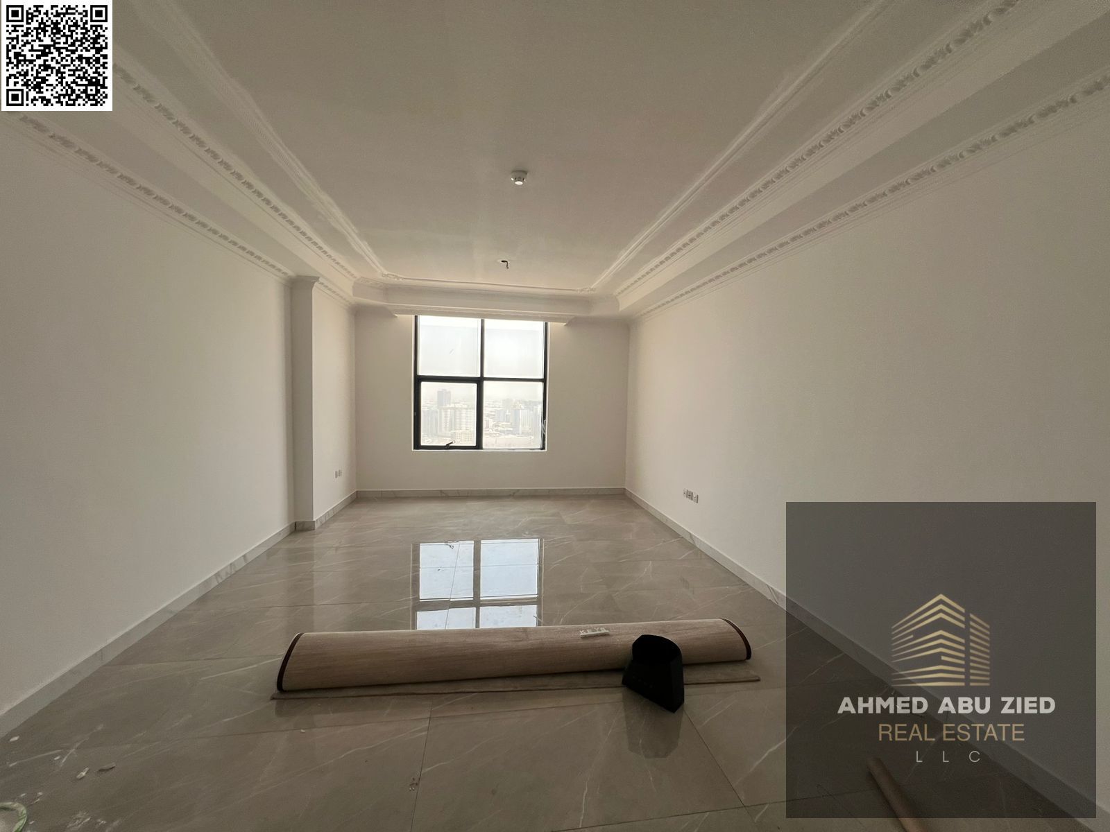 2BR + living room in Al Rashidiya 1, annual rent. Spacious rooms, 2 baths, high-end kitchen, pool, gym, aqua park, easy access to Dubai & Sharjah.
