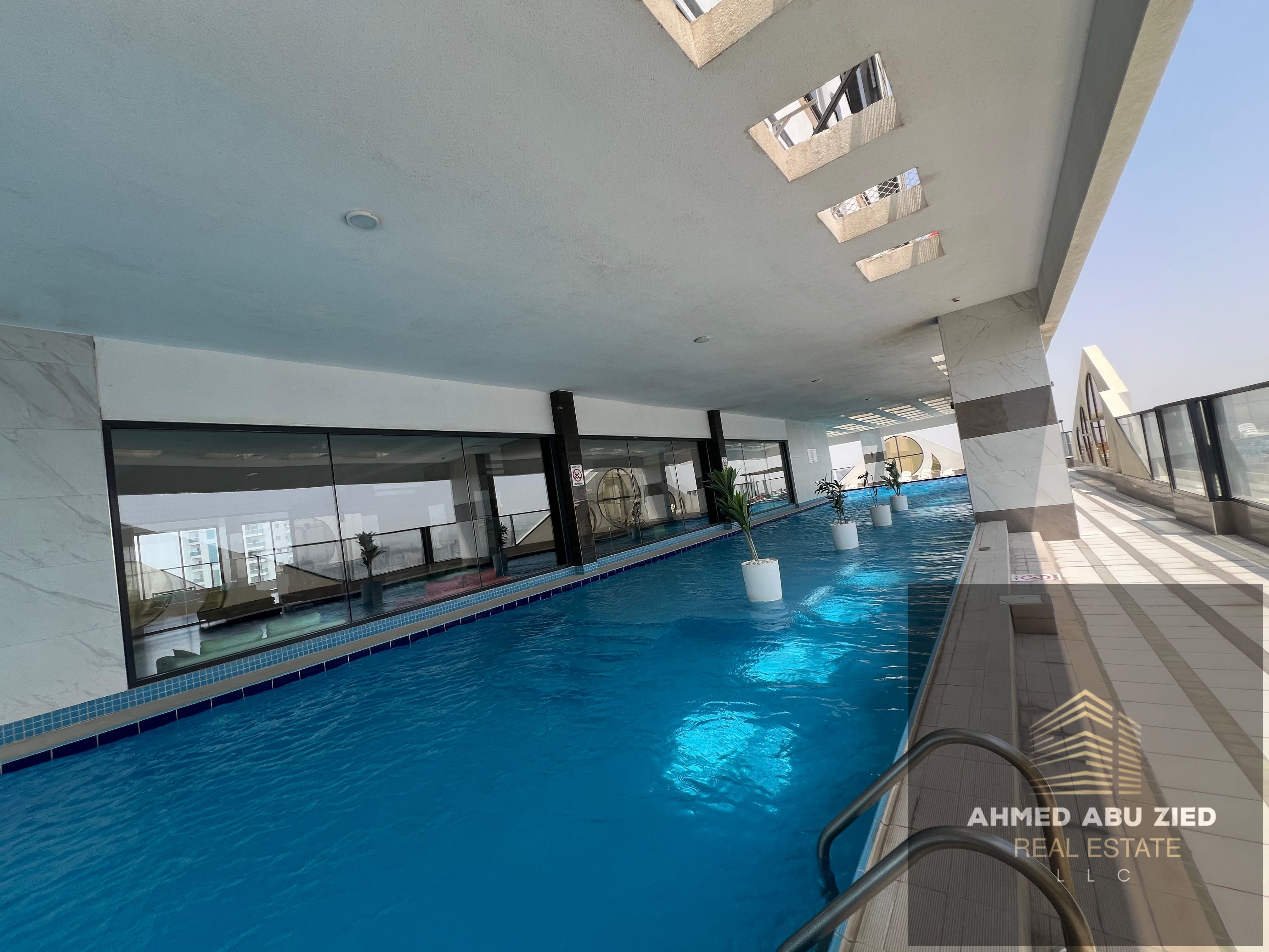 Here’s a concise English version around **150 characters**: **Luxury 2BR or 2BR+living in Al Rashidiya, Ajman with gym, pool, aqua park, parking. AED