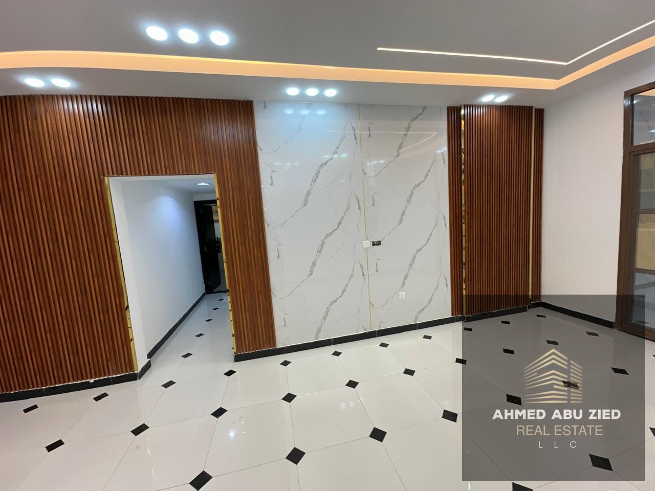 2-bedroom & hall for annual rent in Ajman Al Rawda 3, 2 bathrooms, balcony with open view, near Sheikh Ammar Street, direct access to Dubai & Sharjah.