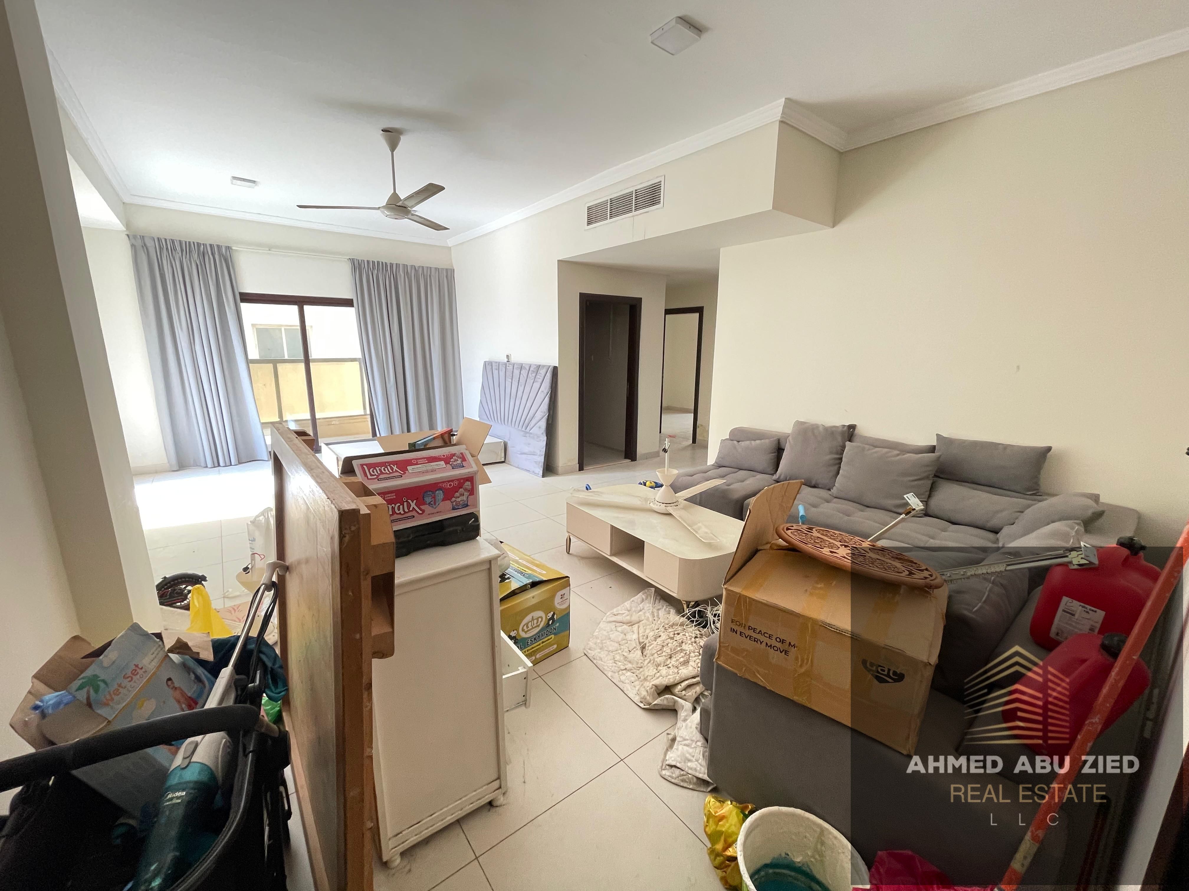 2BR + large rooftop for annual rent in Al Rawda 2, Ajman, 2 baths, balcony with open view, near Layali Beirut & Sheikh Ammar St.