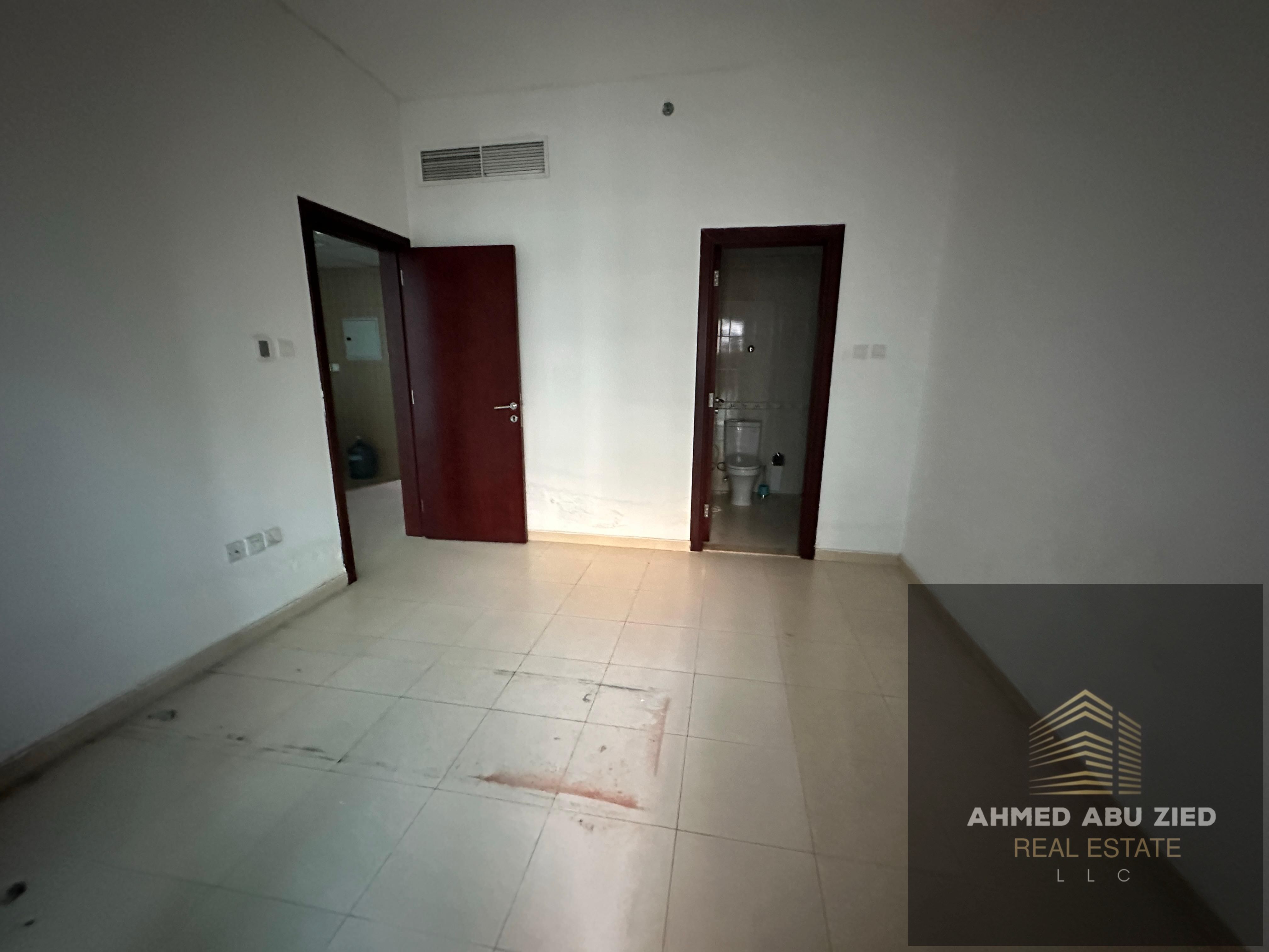 **1BR apartment for annual rent in City Tower, Al Nuaimiya 3, Ajman. 2 baths, balcony, central AC, prime location on Khalifa St.