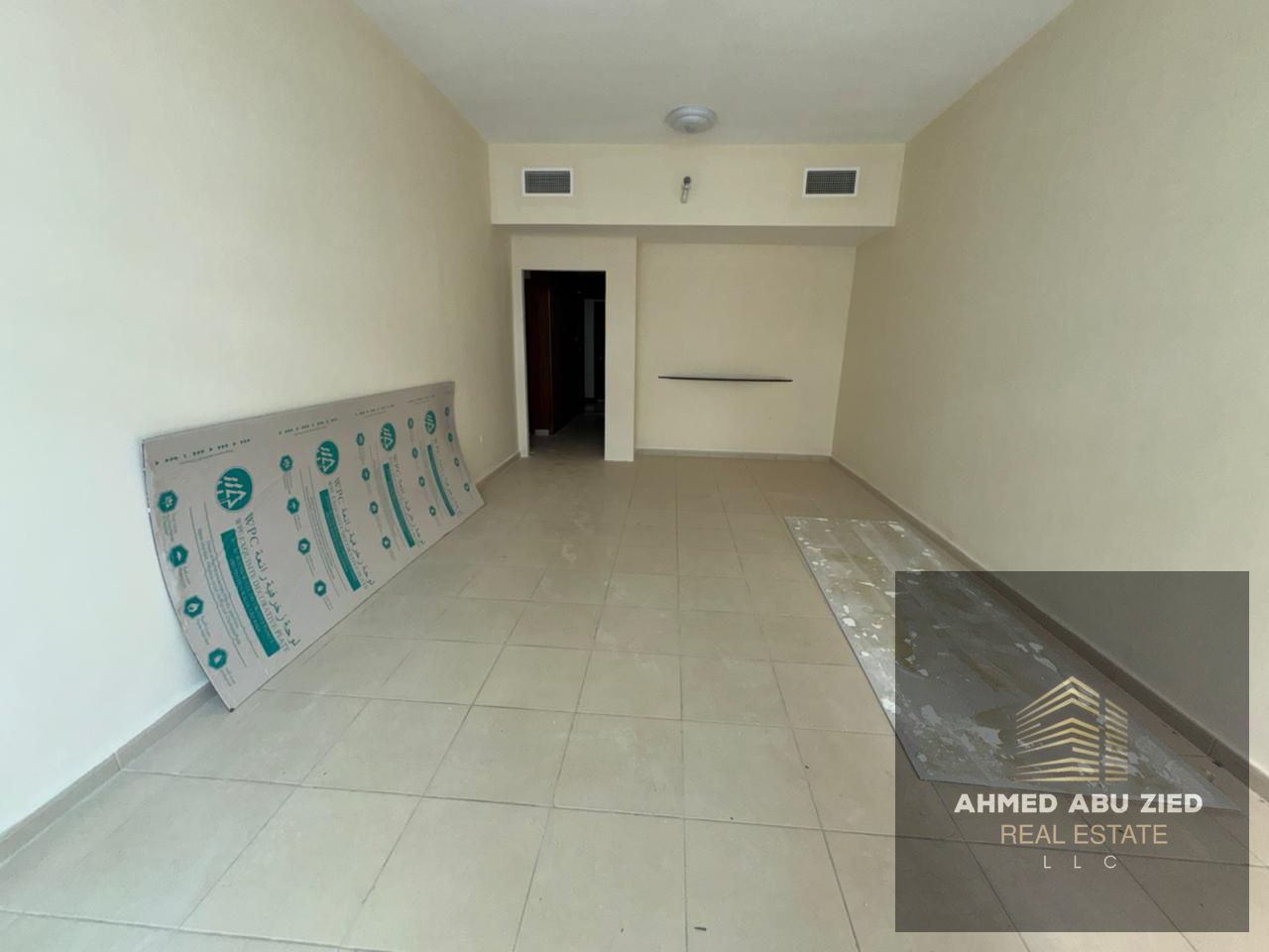 **Large 2BR + living room with storage for annual rent in Rashidiya 3, Ajman One. 3 baths, central AC, free parking.