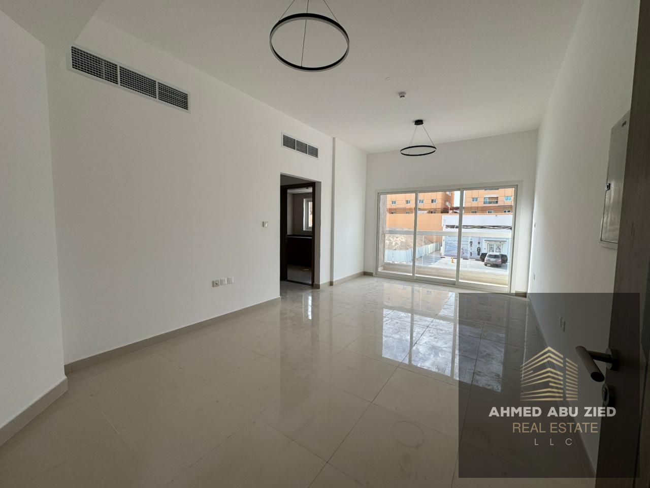 **One-Bedroom Apartment for Annual Rent – First Occupant, Al Jurf 3, Master Bedroom, 2 Bathrooms, Central AC, Balcony, Near Sheikh Mohammed Bin Zayed