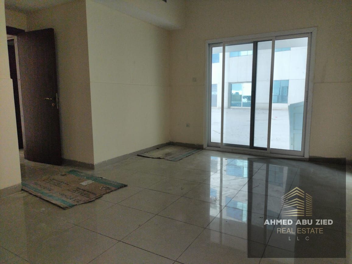 Spacious 1BR apartment with living room in Al Lu’lu’a Towers, Al Rashidiya 1, Ajman. 2 baths, large shared rooftop, garden, kids’ play area, central A
