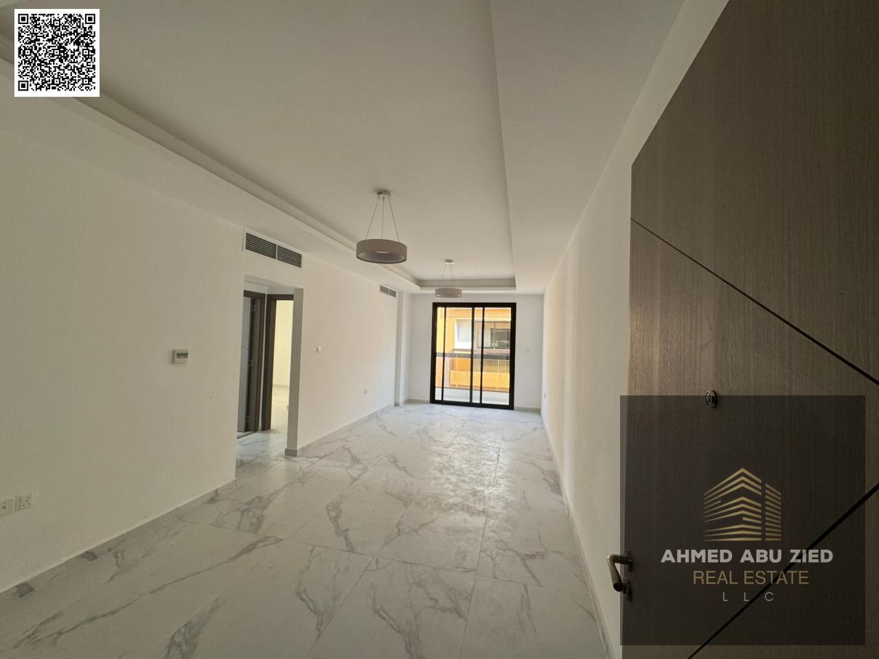 Two bedrooms and a living room, first occupancy in Al Jurf 3, with a balcony and three bathrooms, in a prime and vibrant location with all services av