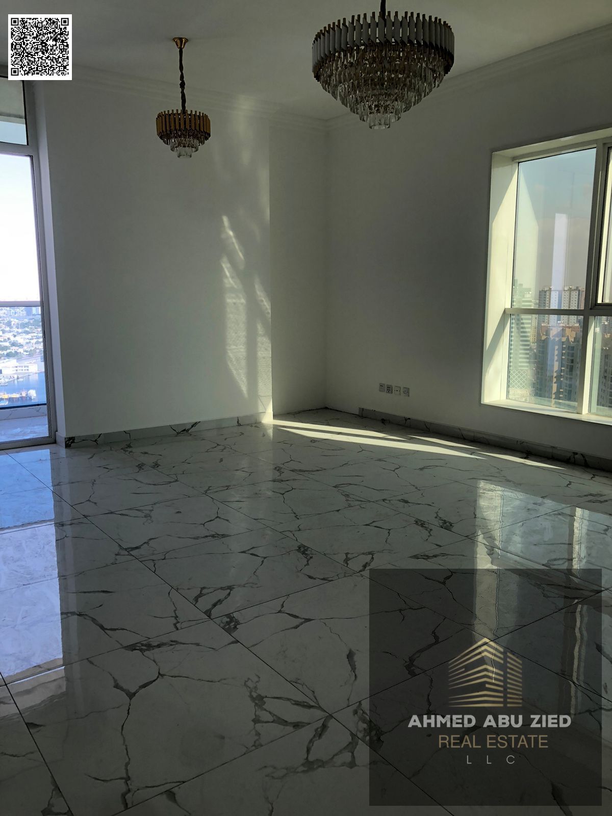 For annual rent in Al Waha Towers: 3 bedrooms, living room with bathroom, 2 balconies with sea view, central air conditioning, and laundry room.
