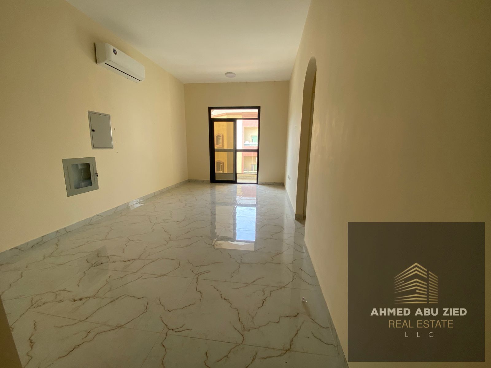 One-bedroom apartment for annual rent in Al Rawda 2, Ajman – featuring a master bedroom, guest bathroom, open-view balcony, and central AC, near Sheik