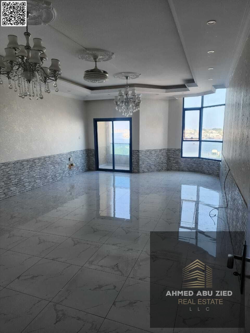 "Luxury 3-bedroom apartment with a maid's room and open view of the creek - annual rent only 57,000 in Al Khor Towers!