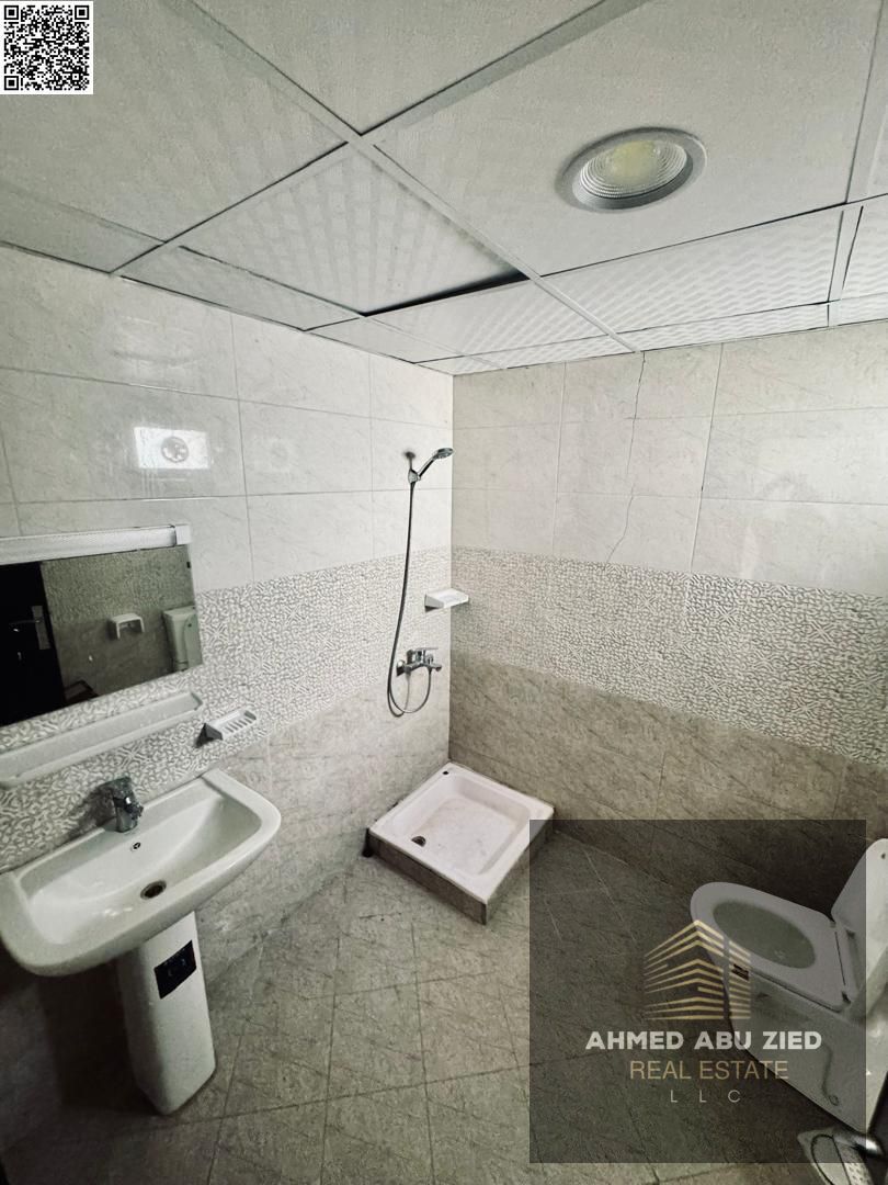 Luxury apartment for annual rent in Al Jurf 3 — One bedroom and living room with high-end finishes, balcony and central air conditioning at a special