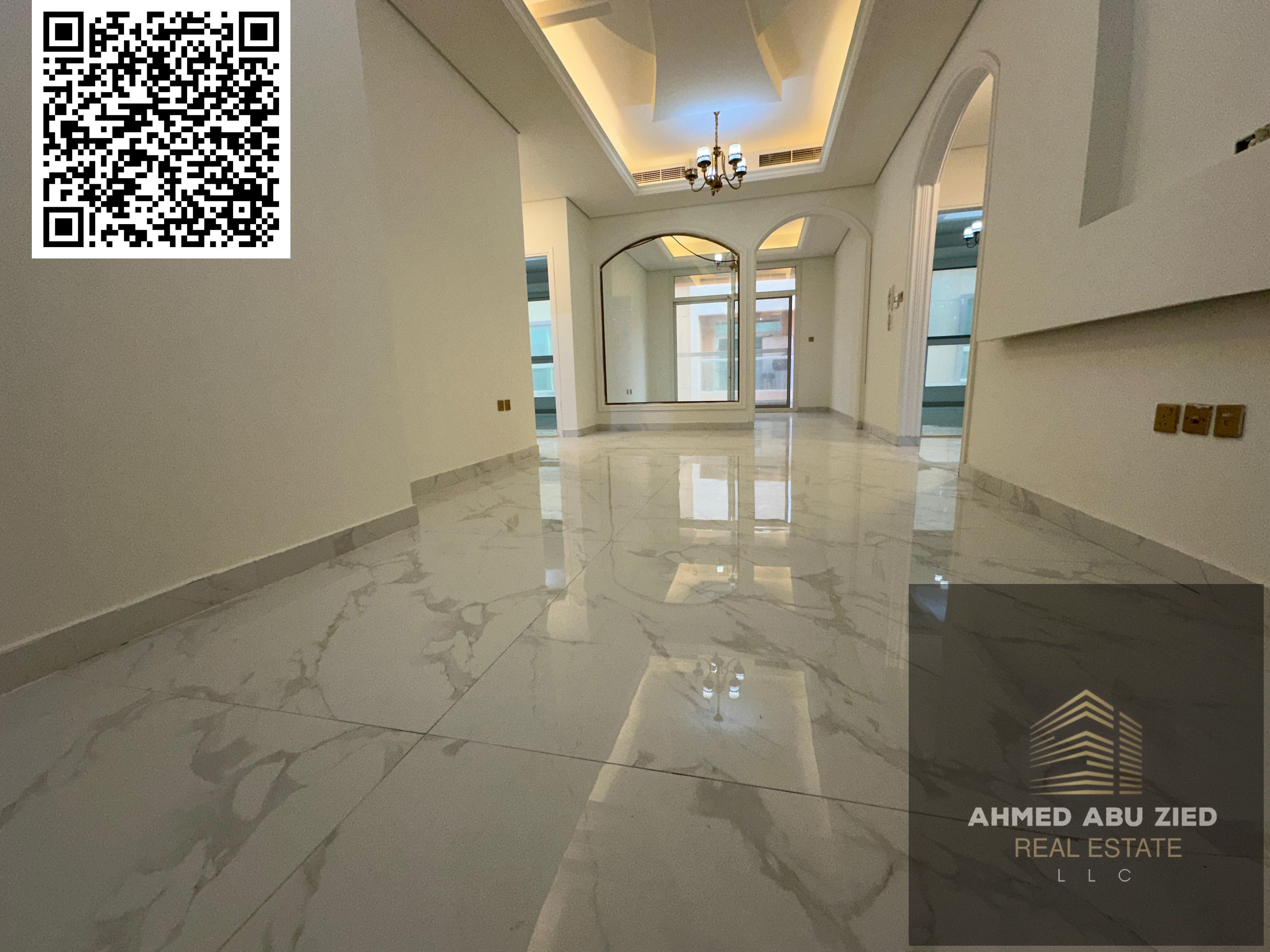 Two bedrooms, a hall, a second bathroom, a balcony, wall wardrobes, a gym, a swimming pool, central air conditioning, and all the features