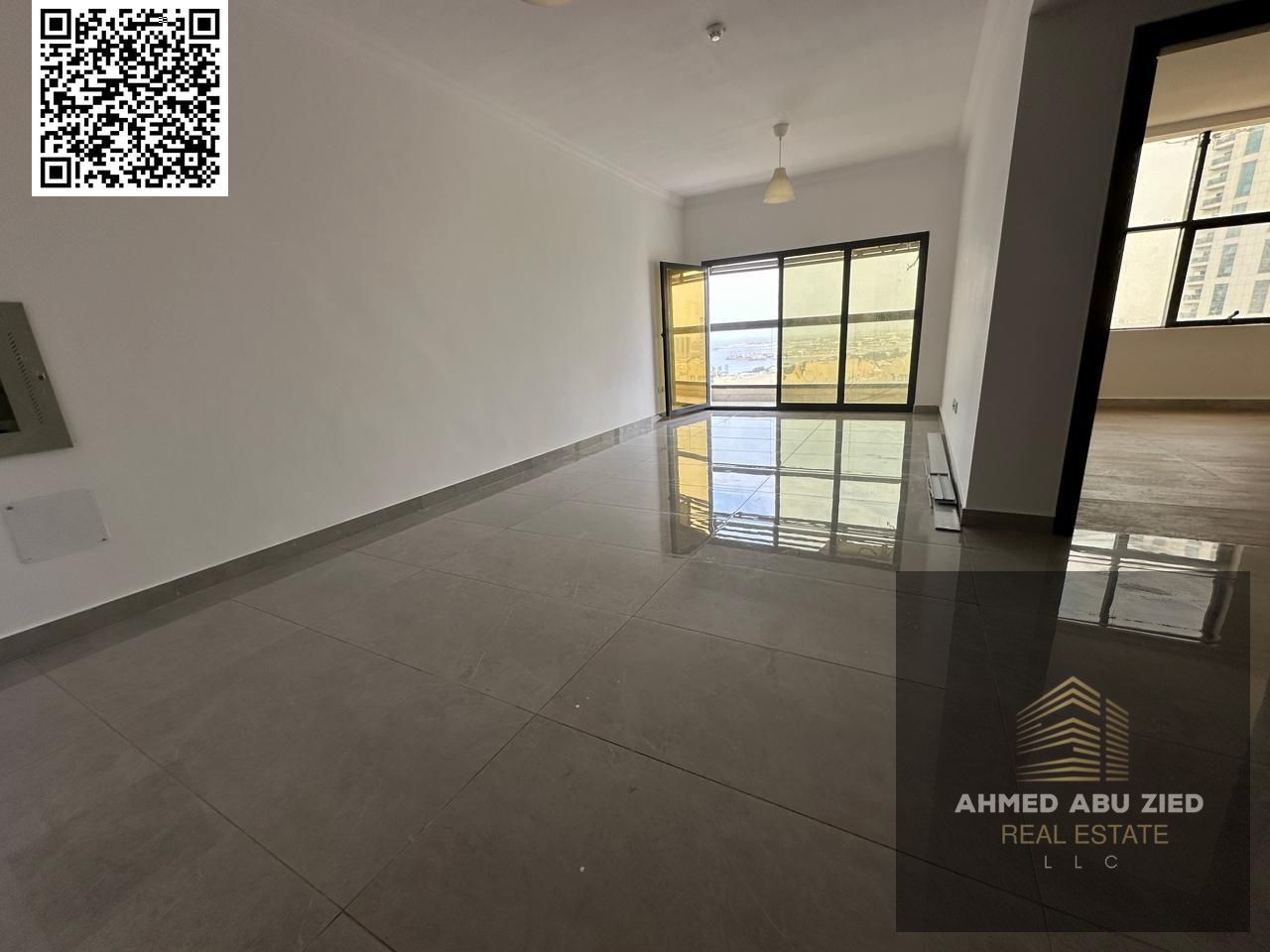 The most luxurious and beautiful apartment for annual rent in Ajman, consisting of a master bedroom, a comfortable living room, a fully equipped kitch