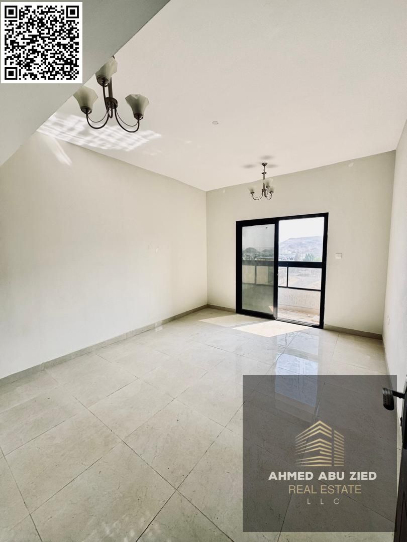 One bedroom and living room for annual rent in Al Jurf 3, Ajman | Central air conditioning | Balcony | Excellent finishing | Strategic location near t