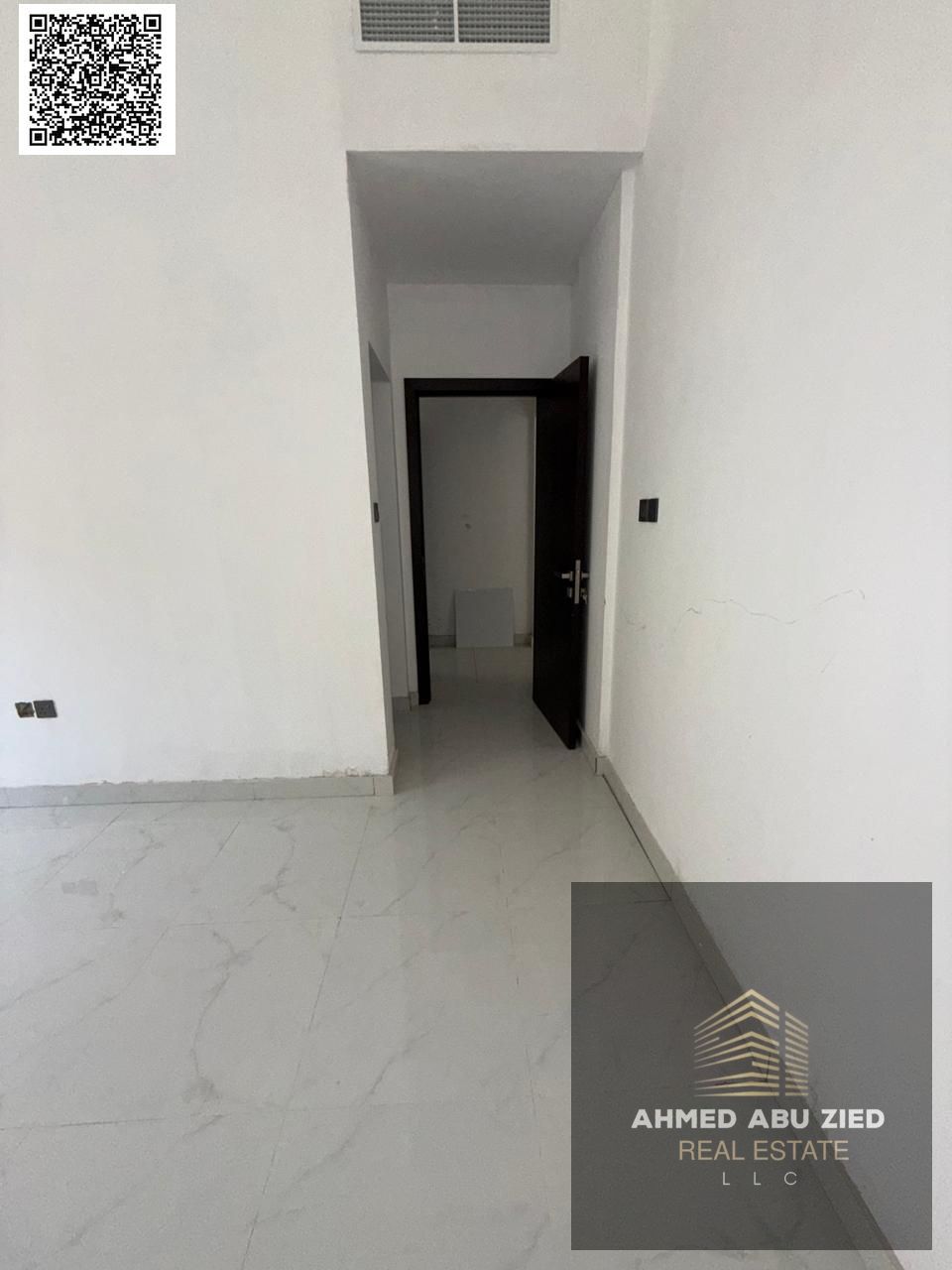 One-bedroom apartment for rent in Al Karama, first occupancy, with open view and balcony, near Ajman Corniche.